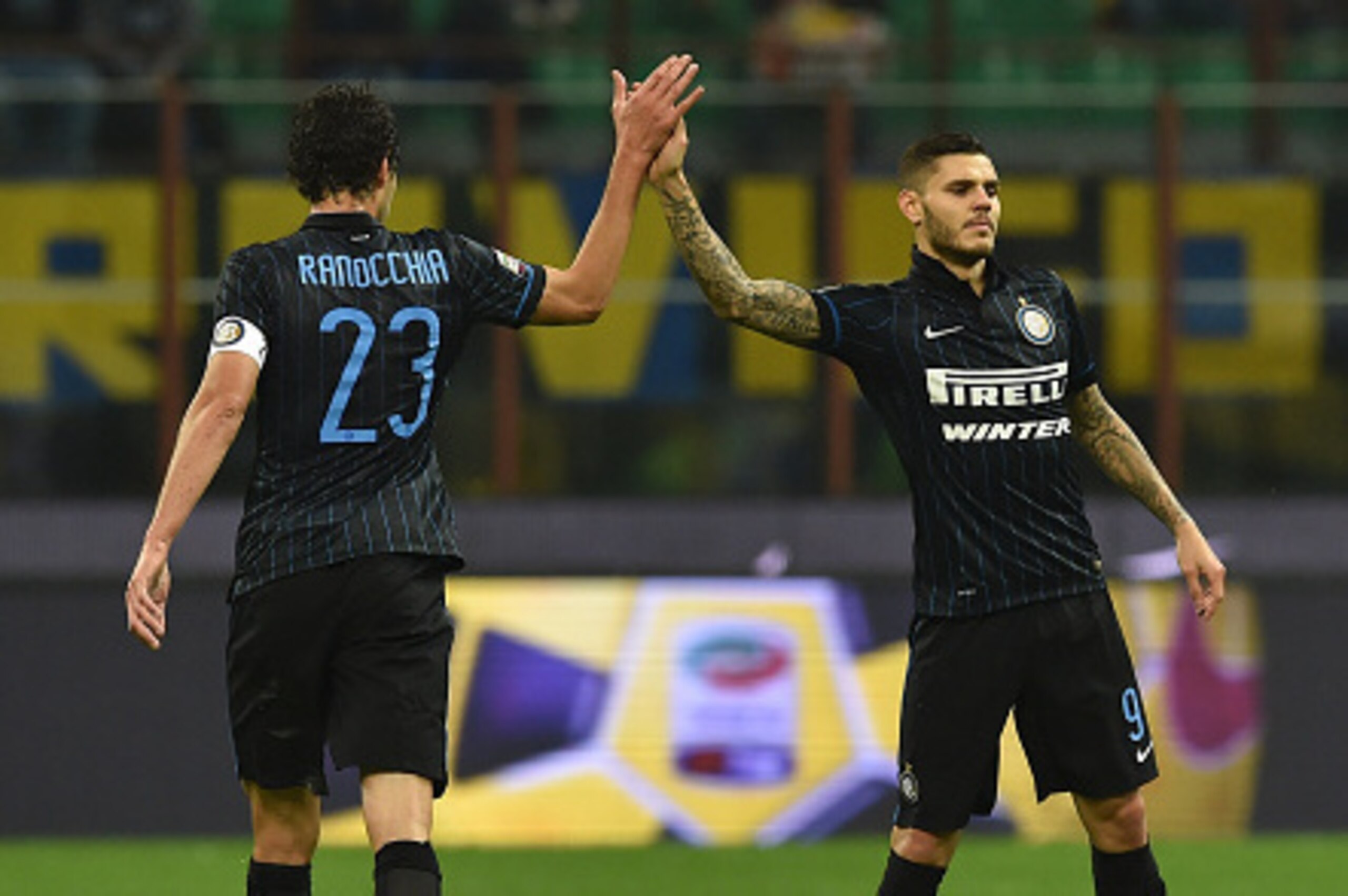 MILAN, ITALY - NOVEMBER 09:  Mauro Emanuel Icardi (R) of FC Internazionale Milano celebrates his goal with team-mates Andrea Ranocchia during the Serie A match between FC Internazionale Milano and Hellas Verona FC at Stadio Giuseppe Meazza on November 9, 