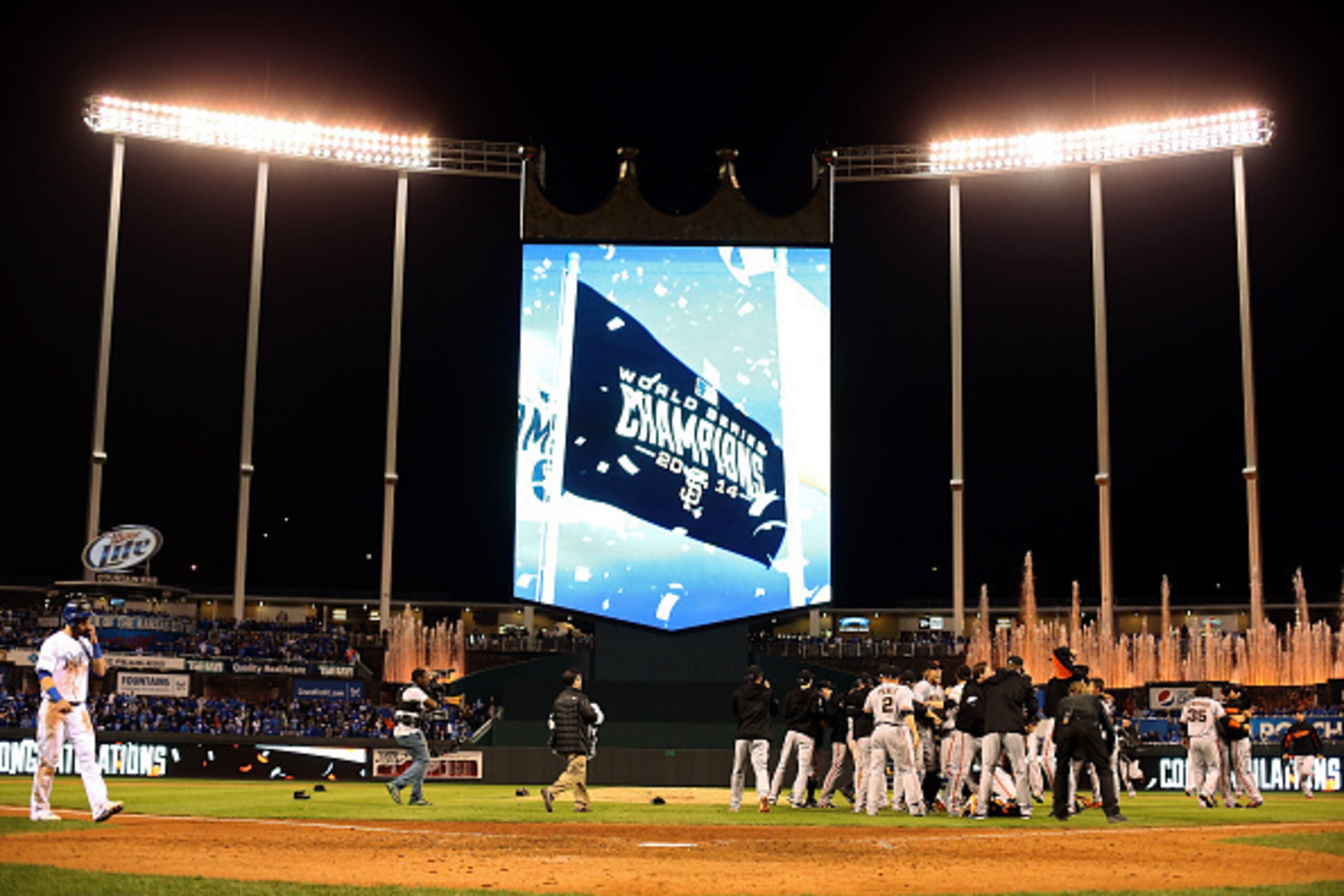 KANSAS CITY, MO - OCTOBER 29:  The San Francisco Giants celebrate after defeating the Kansas City Royals to win Game Seven of the 2014 World Series by a score of 3-2 at Kauffman Stadium on October 29, 2014 in Kansas City, Missouri.  (Photo by Jamie Squire