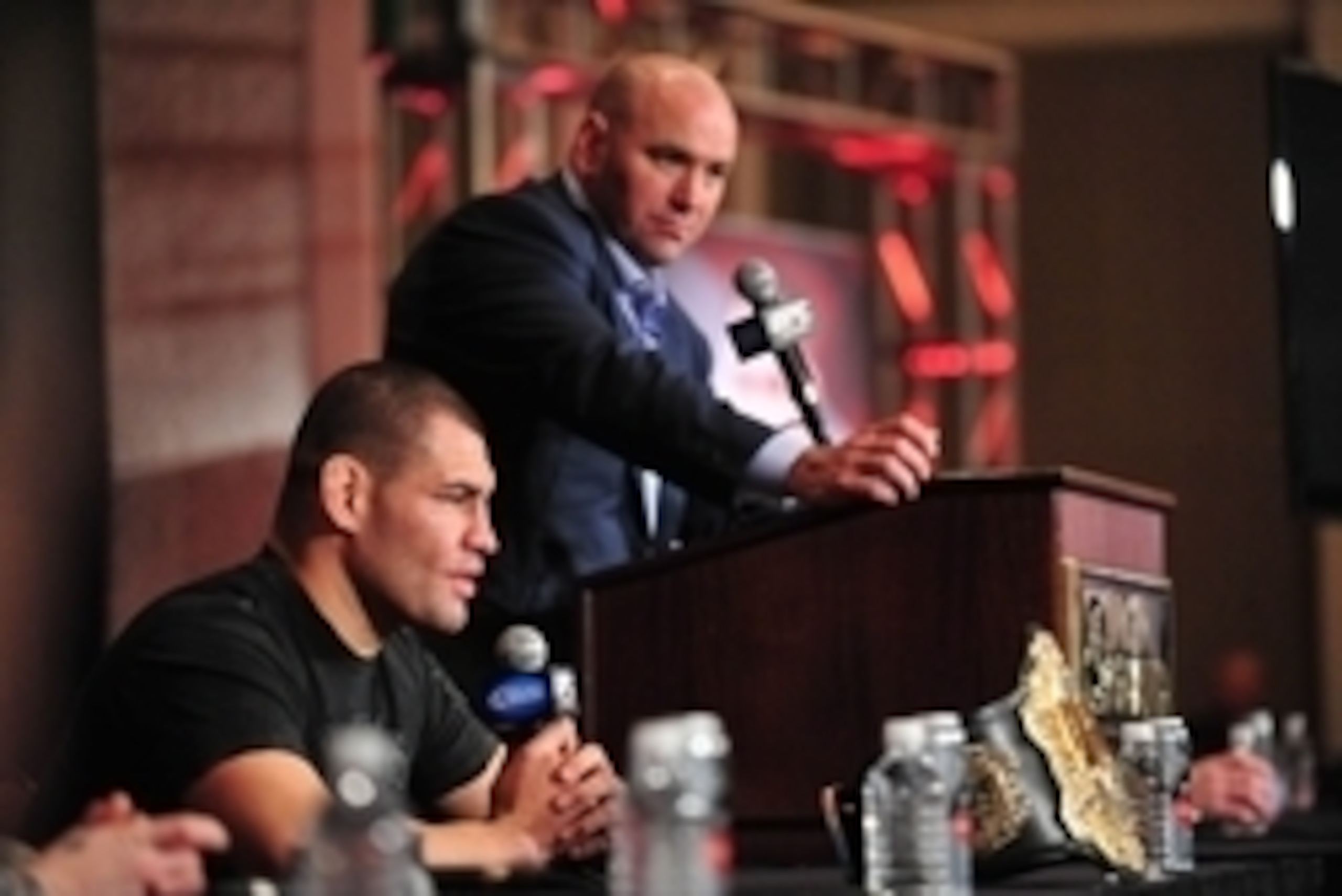 Dec 29, 2012; Las Vegas, NV, USA; Cain Velasquez speaks during post fight press conference as UFC president Dana White listens at UFC 155 at the MGM Grand Garden Arena. Mandatory Credit: Gary A. Vasquez-USA TODAY Sports