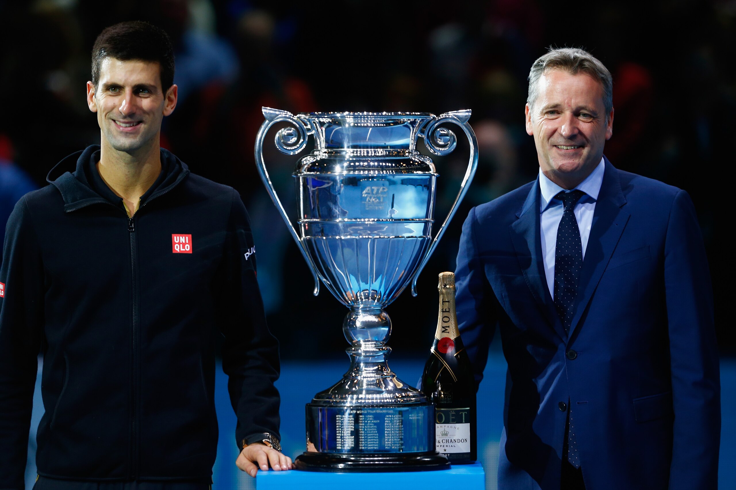LONDON, ENGLAND - NOVEMBER 14:  ATP Executive Chairman and President, Chris Kermode (R) Novak Djokovic of Serbia with the Barclays ATP World Tour No. 1 Award presented by Emirates after the the round robin singles match against Tomas Berdych of Czech Repu