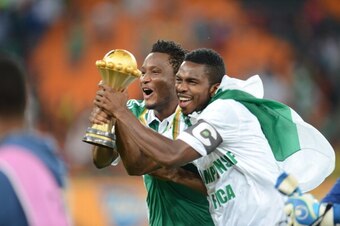 JOHANNESBURG, SOUTH AFRICA - FEBRUARY 10:  John Obi Mikel celebrates holding the trophy during the 2013 Orange African Cup of Nations Final match between Nigeria and Burkina Faso from the National Stadium on February 10, 2013 in Johannesburg, South Africa