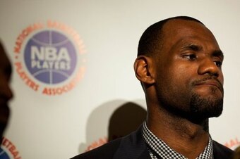 Eliminating max salaries may benefit the likes of LeBron James but may not help players in the NBA's "middle class."