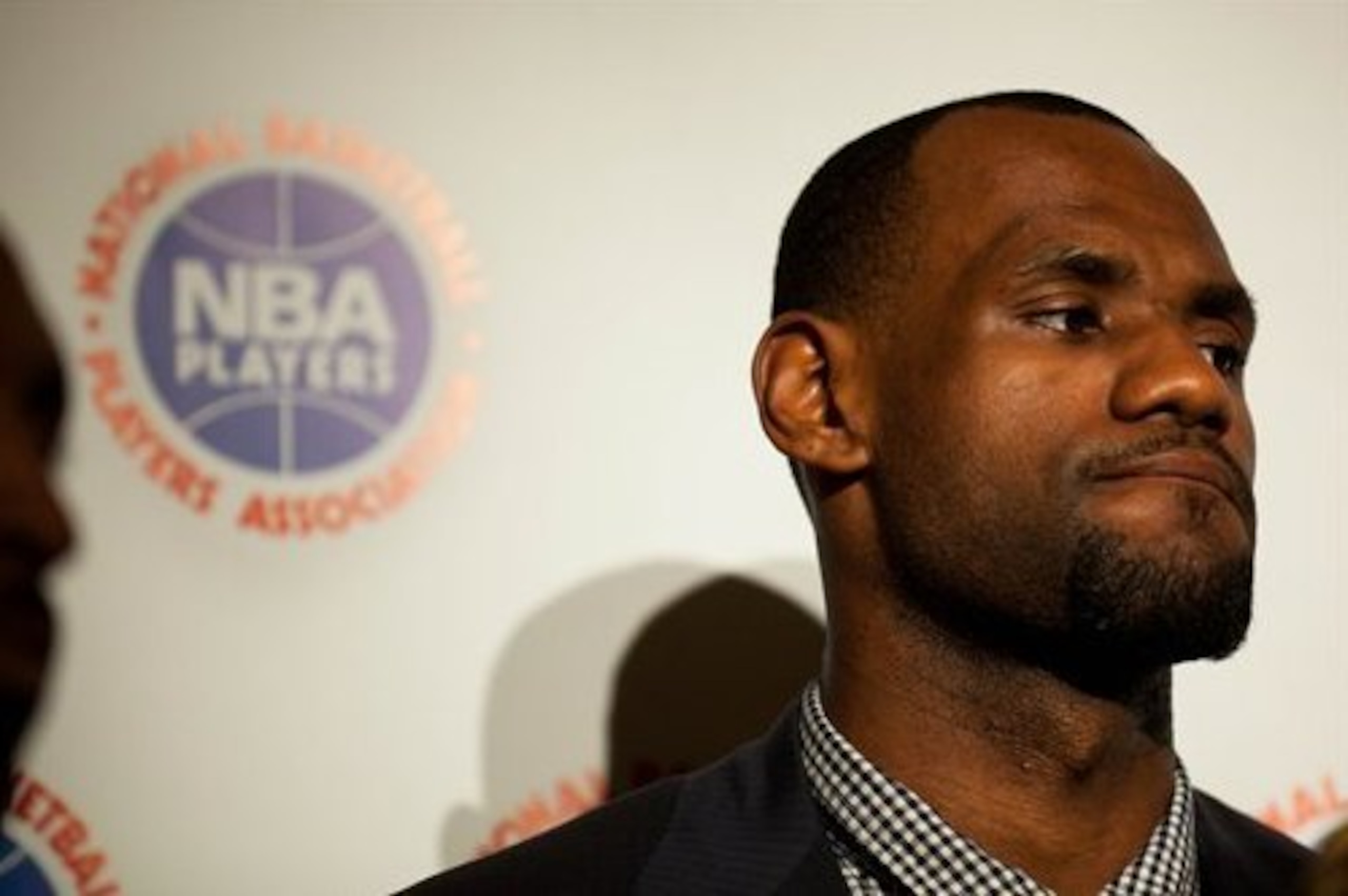 Eliminating max salaries may benefit the likes of LeBron James but may not help players in the NBA's "middle class."