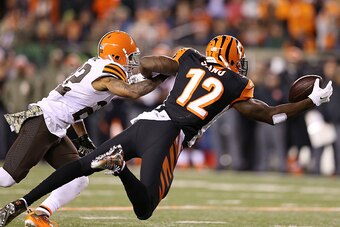 CINCINNATI, OH - NOVEMBER 6 :  Buster Skrine #22 of the Cleveland Browns defends as Mohamed Sanu #12 of the Cincinnati Bengals dives but is unable to make the catch during the first quarter at Paul Brown Stadium on November 6, 2014 in Cincinnati, Ohio. (P