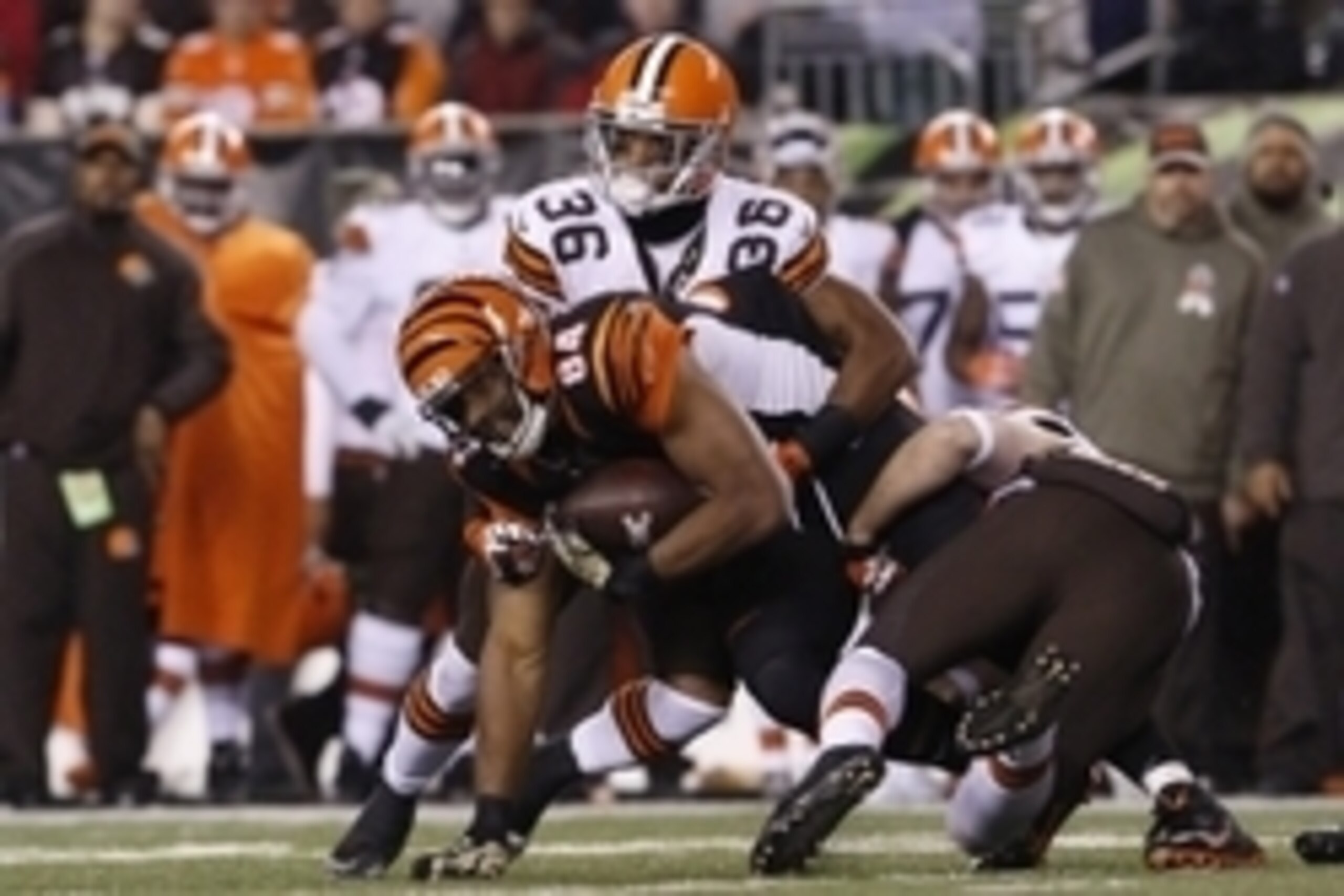 Nov 6, 2014; Cincinnati, OH, USA; Cincinnati Bengals tight end Jermaine Gresham (84) is tackled by Cleveland Browns defensive back K'Waun Williams (36) during the second half at Paul Brown Stadium. The Browns won 24-3. Mandatory Credit: Aaron Doster-USA T