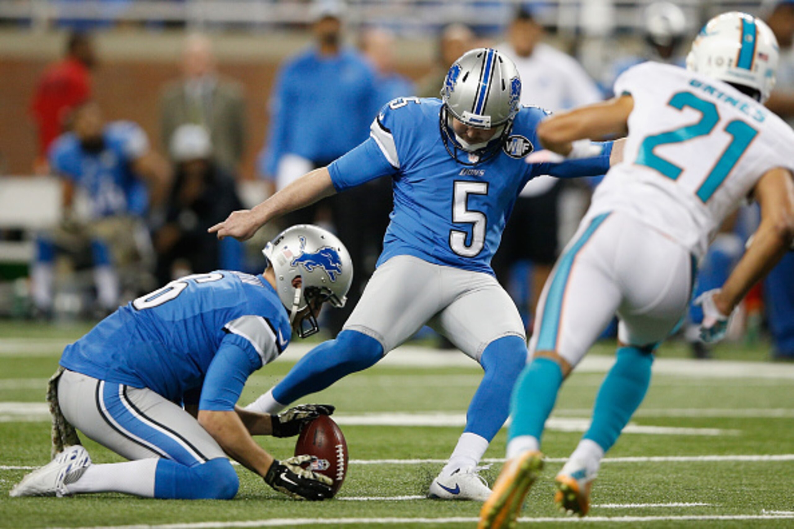 DETROIT, MI - NOVEMBER 09: Matt Prater #5 of the Detroit Lions kicks a third quarter field goal that is blocked by the Miami Dolphins at Ford Field on November 09, 2014 in Detroit, Michigan. (Photo by Joe Robbins/Getty Images)