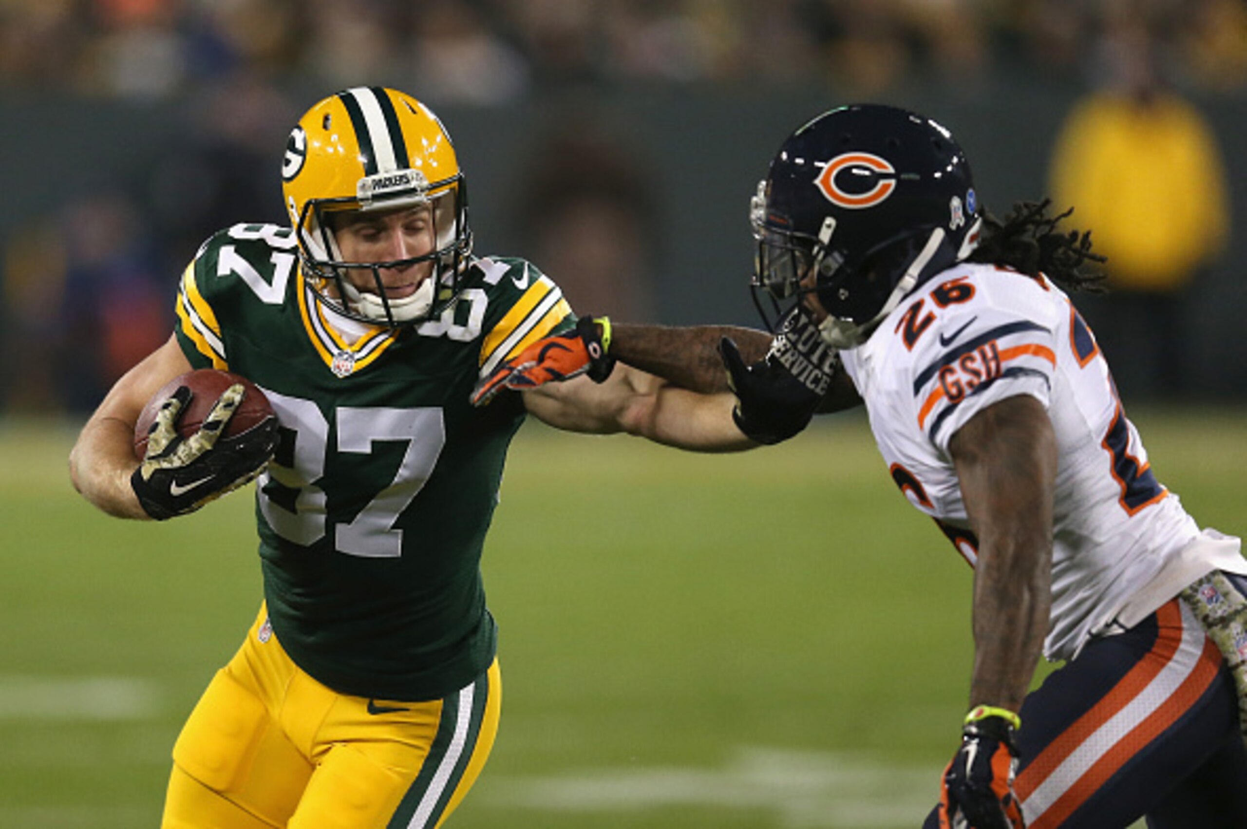 GREEN BAY, WI - NOVEMBER 09:  Jordy Nelson #87 of the Green Bay Packers pushes back  Tim Jennings #26 of the Chicago Bears in the first half of the game at Lambeau Field on November 9, 2014 in Green Bay, Wisconsin. (Photo by Jonathan Daniel/Getty Images)