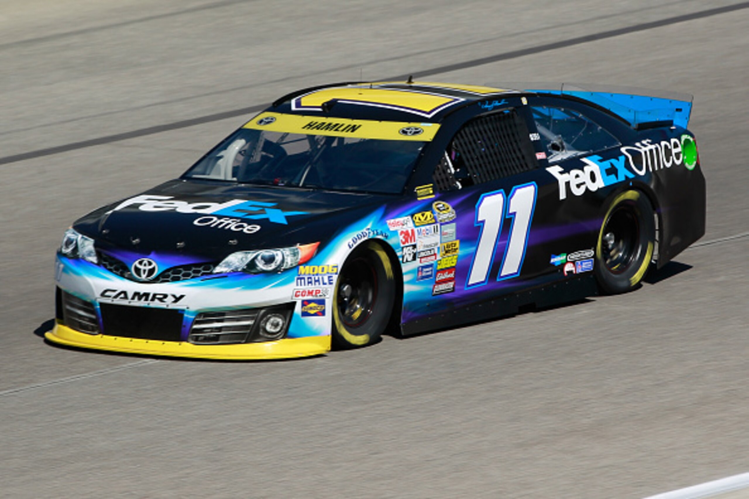 FORT WORTH, TX - OCTOBER 31:  Denny Hamlin, driver of the #11 FedEx Office Toyota, practices for the NASCAR Sprint Cup Series AAA Texas 500 at Texas Motor Speedway on October 31, 2014 in Fort Worth, Texas.  (Photo by Brian Lawdermilk/Getty Images)
