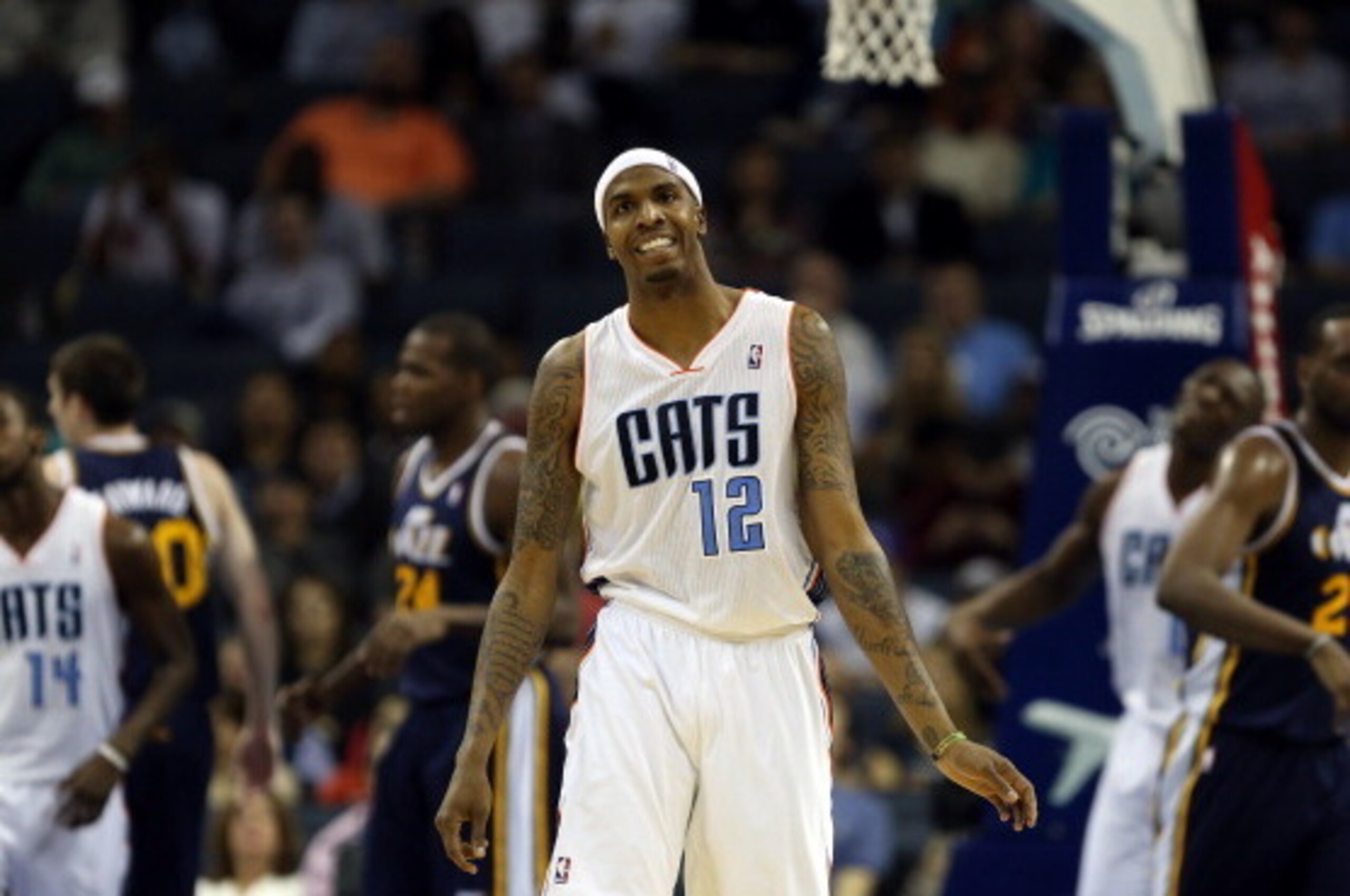 CHARLOTTE, NC - JANUARY 09:  Tyrus Thomas #12 of the Charlotte Bobcats reacts after a play during their game against the Utah Jazz at Time Warner Cable Arena on January 9, 2013 in Charlotte, North Carolina.  NOTE TO USER: User expressly acknowledges and a