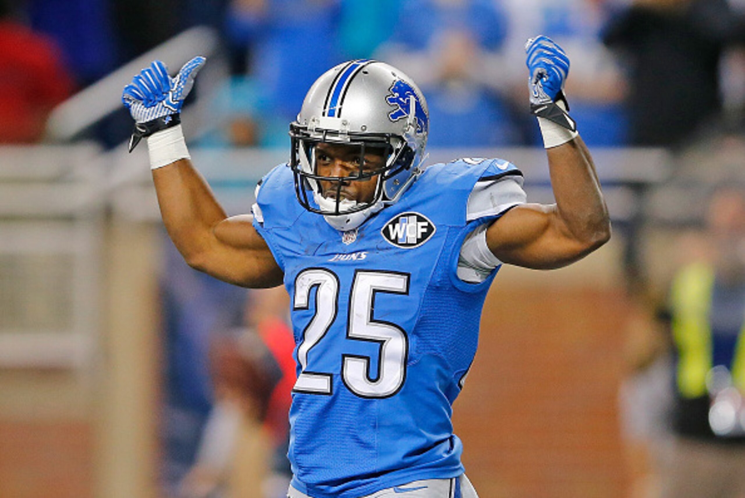 DETROIT, MI - NOVEMBER 09: Theo Riddick #25 of the Detroit Lions celebrates after scoring the game winning score on a 11 yard pass from Matthew Stafford (not in photo) during the fourth quarter of the game against the Miami Dolphins at Ford Field on Novem DETROIT, MI - NOVEMBER 09: Theo Riddick #25 of the Detroit Lions celebrates after scoring the game winning score on a 11 yard pass from Matthew Stafford (not in photo) during the fourth quarter of the game against the Miami Dolphins at Ford Field on Novem