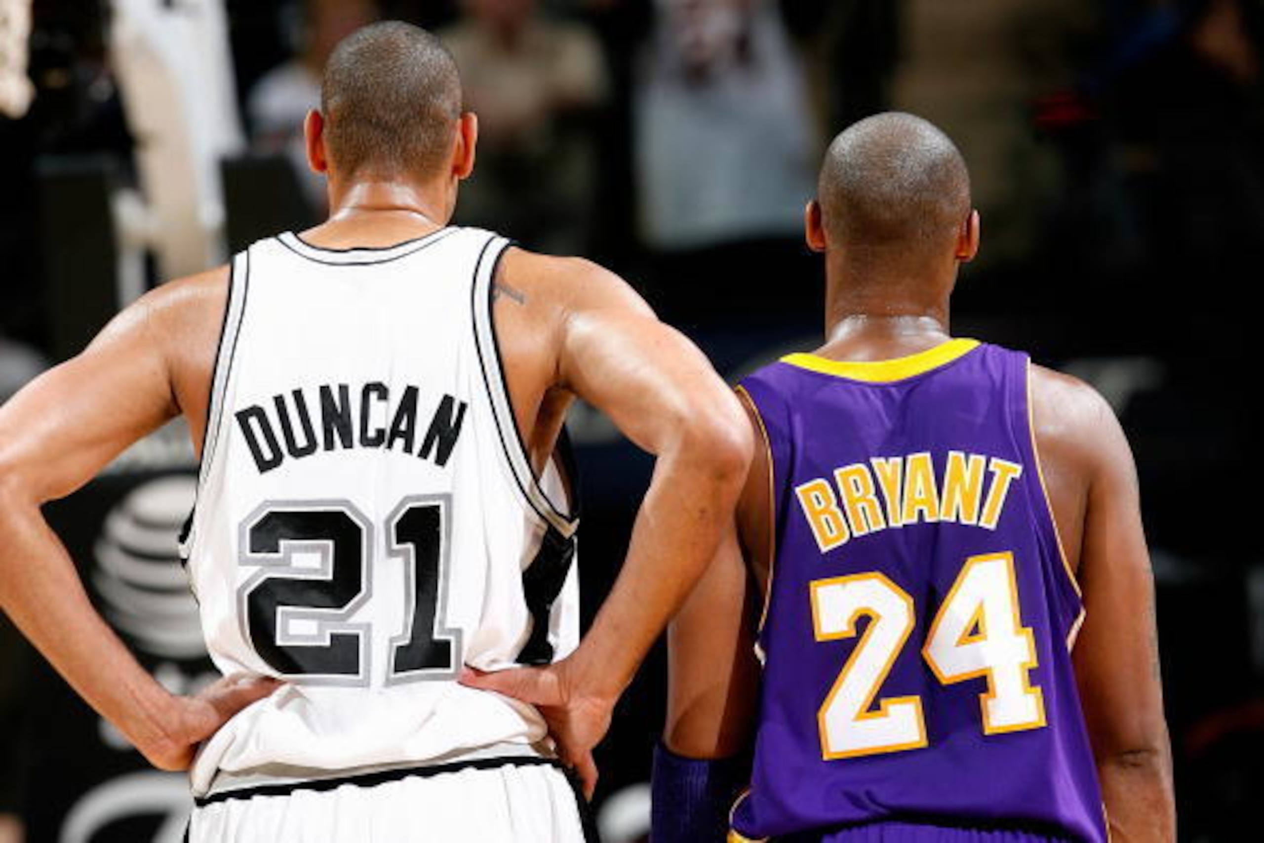 SAN ANTONIO - JANUARY 12: Tim Duncan #21 of the San Antonio Spurs and Kobe Bryant #24 of the Los Angeles Lakers stand together during the game on January 12, 2010 at the AT&T Center in San Antonio, Texas. The Spurs won 105-85. NOTE TO USER: User expres SAN ANTONIO - JANUARY 12: Tim Duncan #21 of the San Antonio Spurs and Kobe Bryant #24 of the Los Angeles Lakers stand together during the game on January 12, 2010 at the AT&T Center in San Antonio, Texas. The Spurs won 105-85. NOTE TO USER: User expres