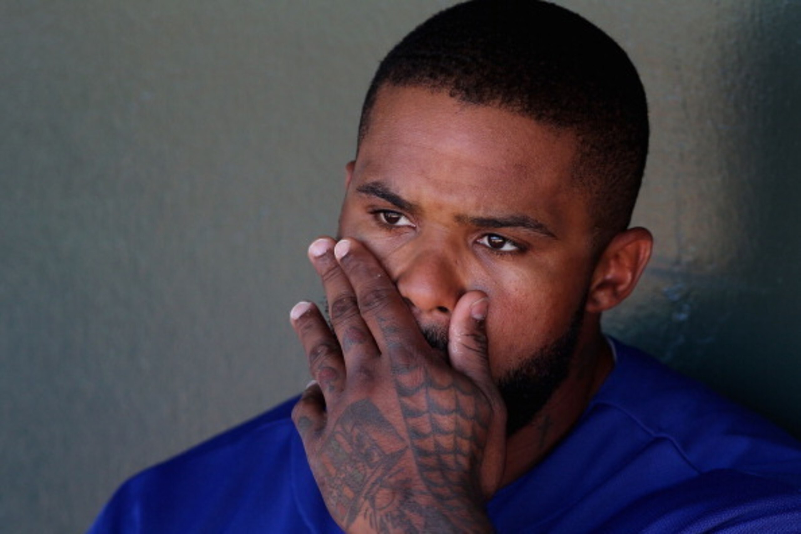 SURPRISE, AZ - MARCH 08:  Prince Fielder #84 of the Texas Rangers sits in the dugout during the spring training game against the Los Angeles Dodgers at Surprise Stadium on March 8, 2014 in Surprise, Arizona.  (Photo by Christian Petersen/Getty Images)