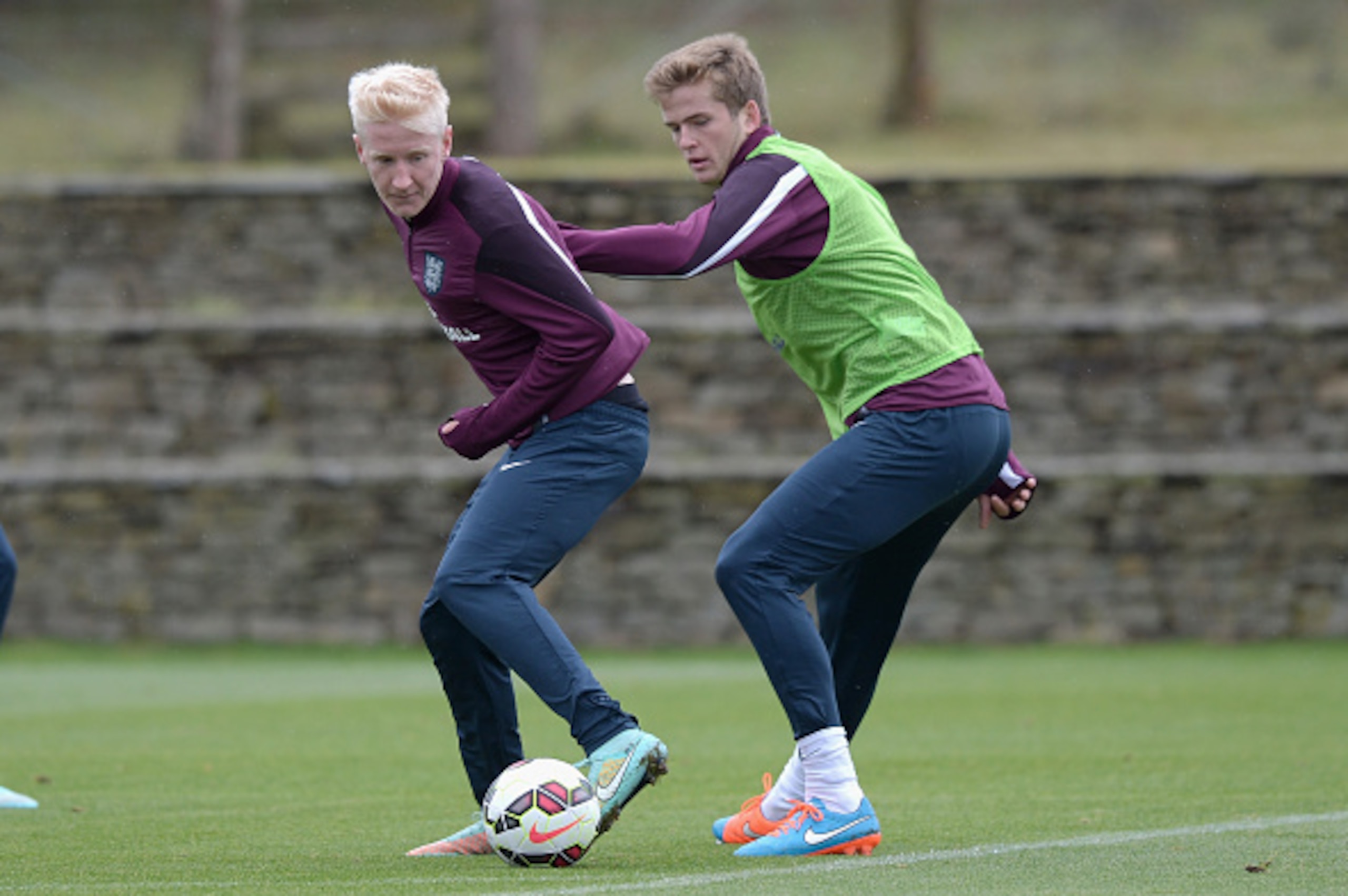 BURTON-UPON-TRENT, ENGLAND - OCTOBER 07:  Will Hughes and Eric Dier of England during an England Under 21 training session at St Georges Park on October 7, 2014 in Burton-upon-Trent, England.  (Photo by Gareth Copley/Getty Images)