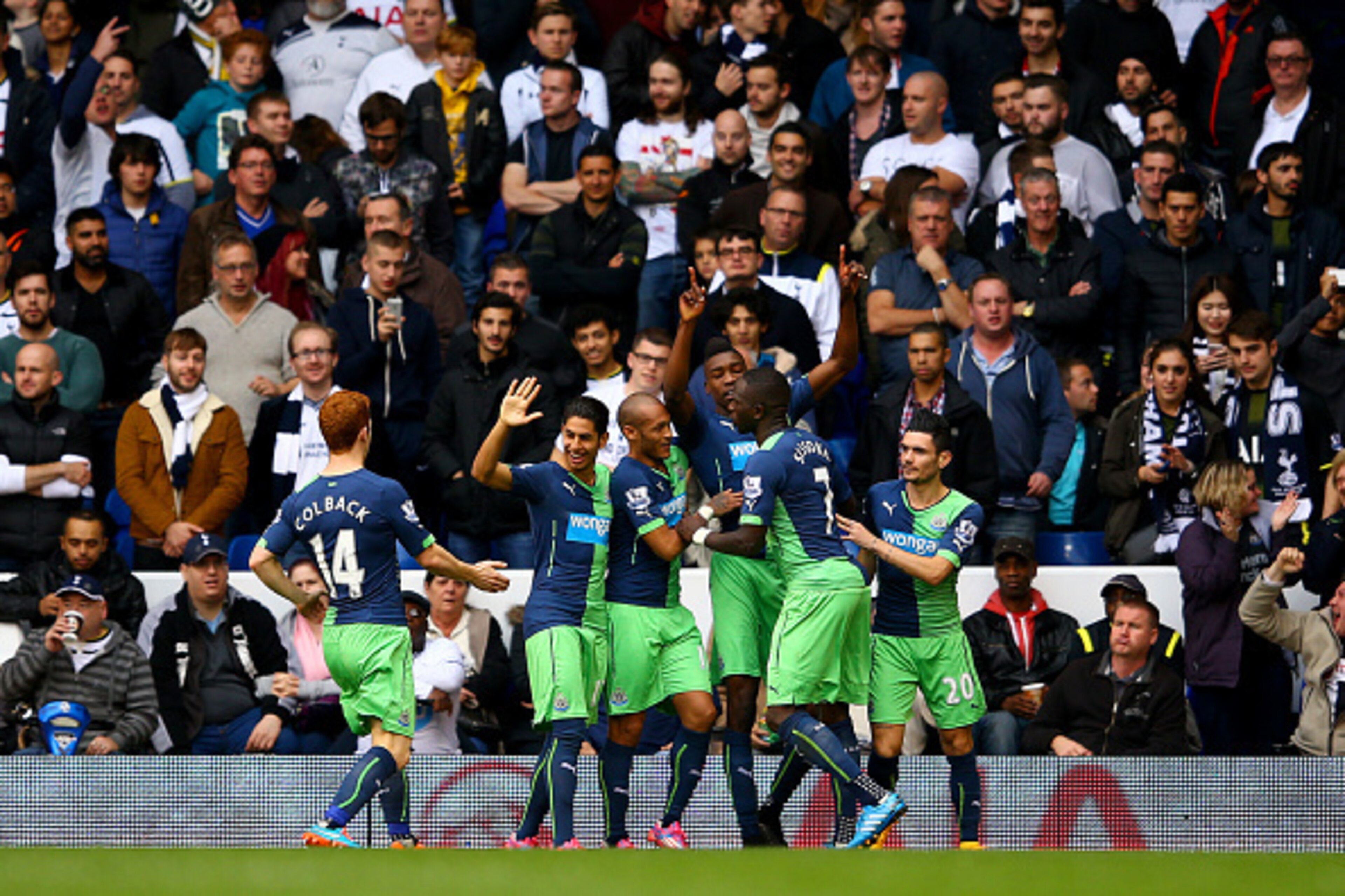 LONDON, ENGLAND - OCTOBER 26:  Sammy Ameobi of Newcastle United celebrates with team-mates after scoring his team's first goal during the Barclays Premier League match between Tottenham Hotspur and Newcastle United at White Hart Lane on October 26, 2014 i