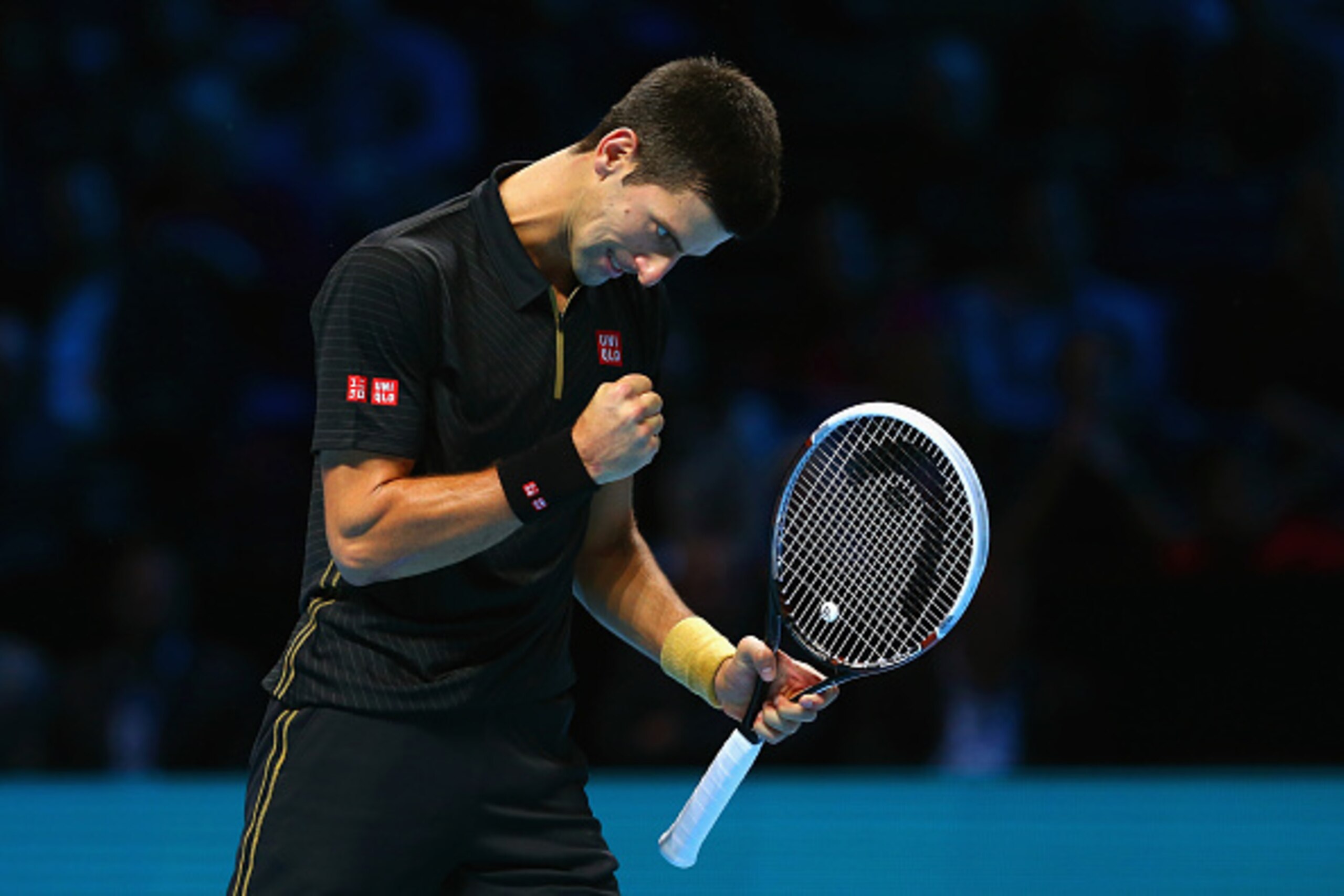 LONDON, ENGLAND - NOVEMBER 14:  Novak Djokovic of Serbia celebrates a point in the round robin singles match against Tomas Berdych of Czech Republic on day six of the Barclays ATP World Tour Finals at O2 Arena on November 14, 2014 in London, England.  (Ph