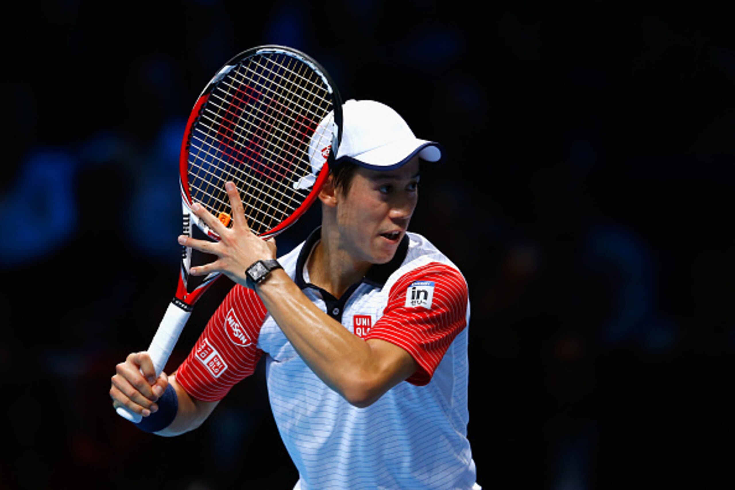 LONDON, ENGLAND - NOVEMBER 15:  Kei Nishikori of Japan in action in the singles semi-final match against Novak Djokovic of Serbia on day seven of the Barclays ATP World Tour Finals at O2 Arena on November 15, 2014 in London, England.  (Photo by Julian Fin