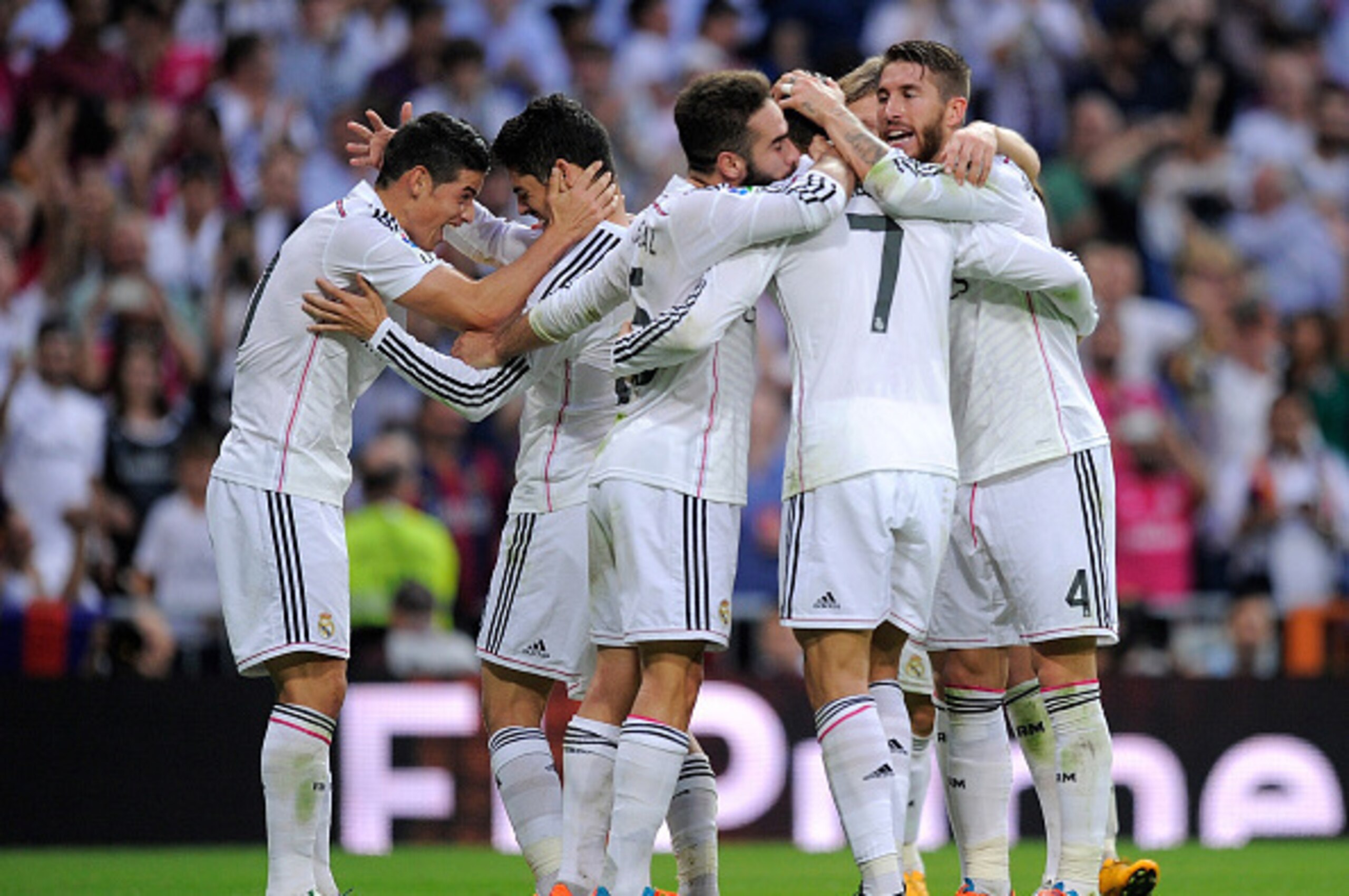 MADRID, SPAIN - OCTOBER 25: James Rodriguez (L) of Real Madrid celebrates with Isco after Real scored their 3rd goal during the La Liga match between Real Madrid CF and FC Barcelona at Estadio Santiago Bernabeu on October 25, 2014 in Madrid, Spain. (Ph MADRID, SPAIN - OCTOBER 25: James Rodriguez (L) of Real Madrid celebrates with Isco after Real scored their 3rd goal during the La Liga match between Real Madrid CF and FC Barcelona at Estadio Santiago Bernabeu on October 25, 2014 in Madrid, Spain. (Ph