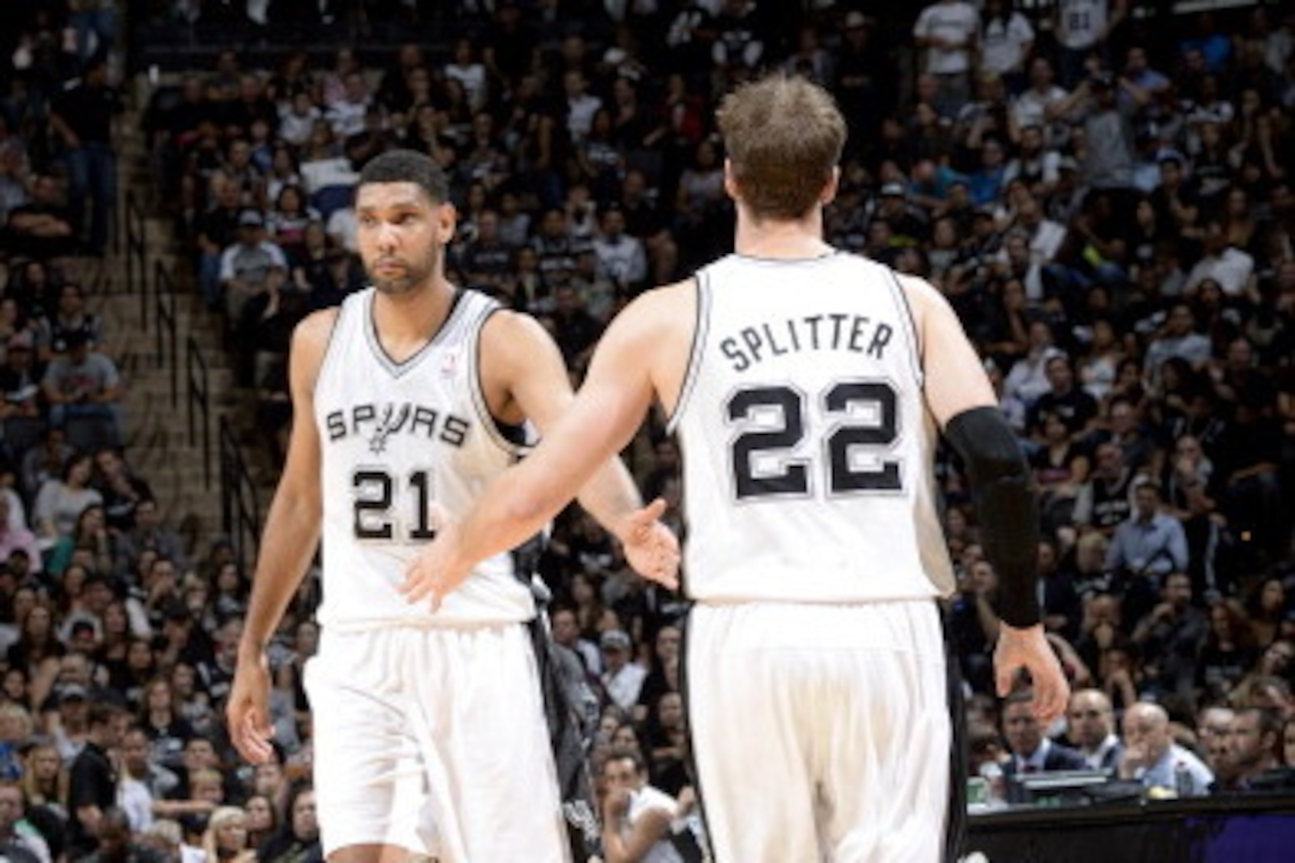 SAN ANTONIO, TX - MAY 29: Tim Duncan #21 and Tiago Splitter #22 of the San Antonio Spurs celebrate during a game against the Oklahoma City Thunder in Game Five of the Western Conference Finals during the 2014 NBA Playoffs on May 29, 2014 at the AT&T Cente