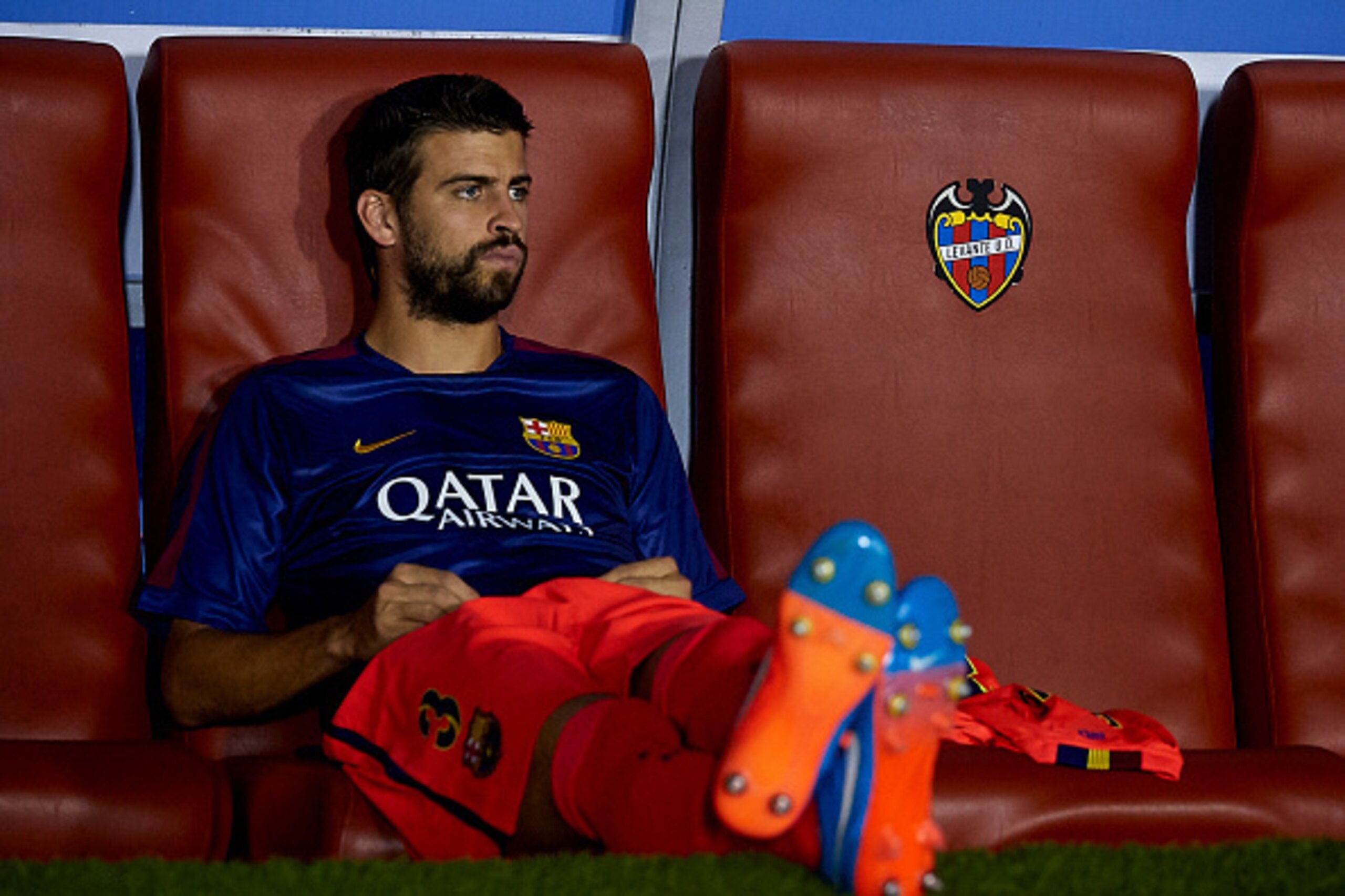 VALENCIA, SPAIN - SEPTEMBER 21:  Gerard Pique of Barcelona watches from the subsitute bench prior to the La Liga match between Levante UD and FC Barcelona at Ciutat de Valencia on September 21, 2014 in Valencia, Spain.  (Photo by Manuel Queimadelos Alonso