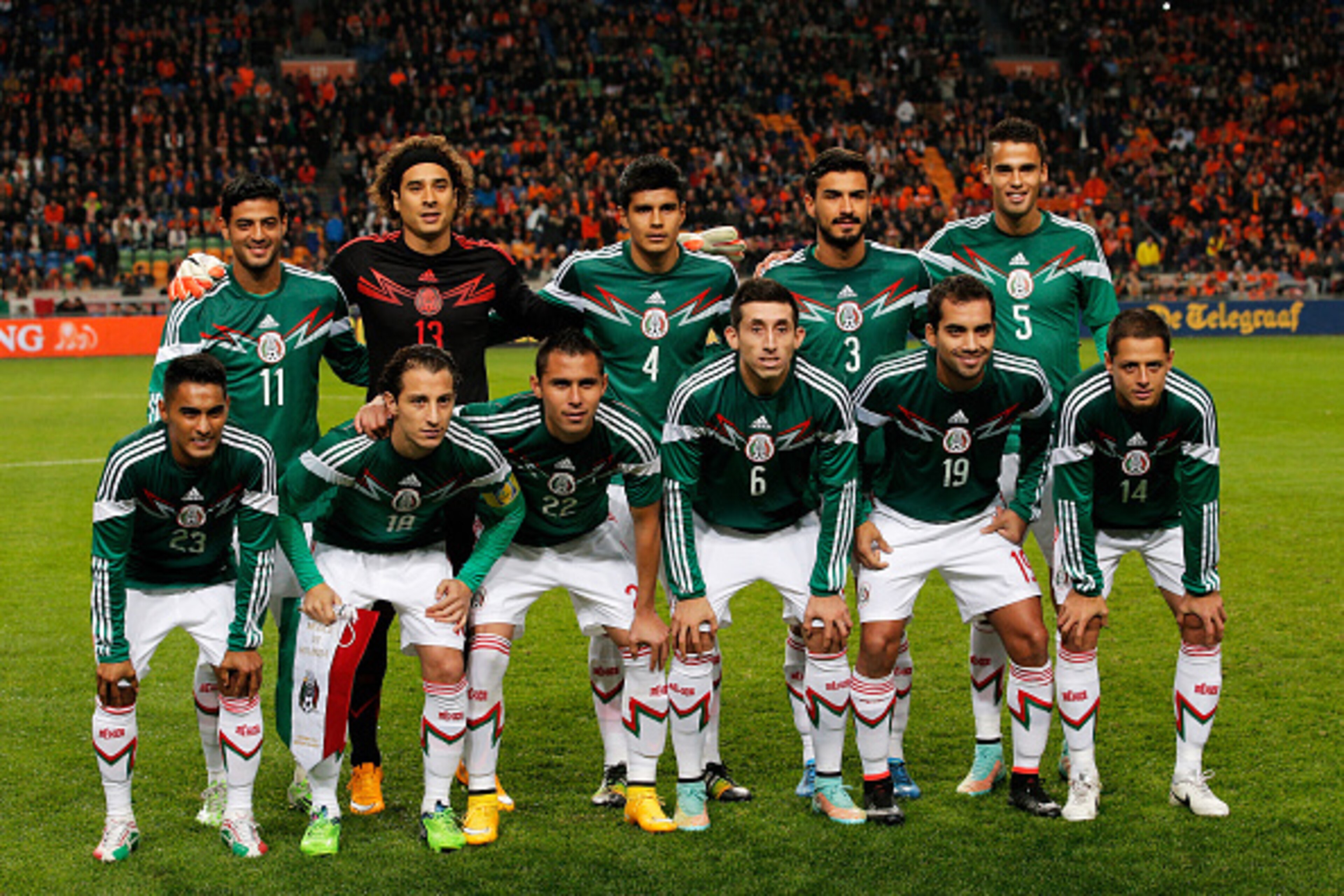 AMSTERDAM, NETHERLANDS - NOVEMBER 12:  The Mexico team line up prior to the international friendly match between Netherlands and Mexico held at the Amsterdam ArenA on November 12, 2014 in Amsterdam, Netherlands.  (Photo by Dean Mouhtaropoulos/Getty Images