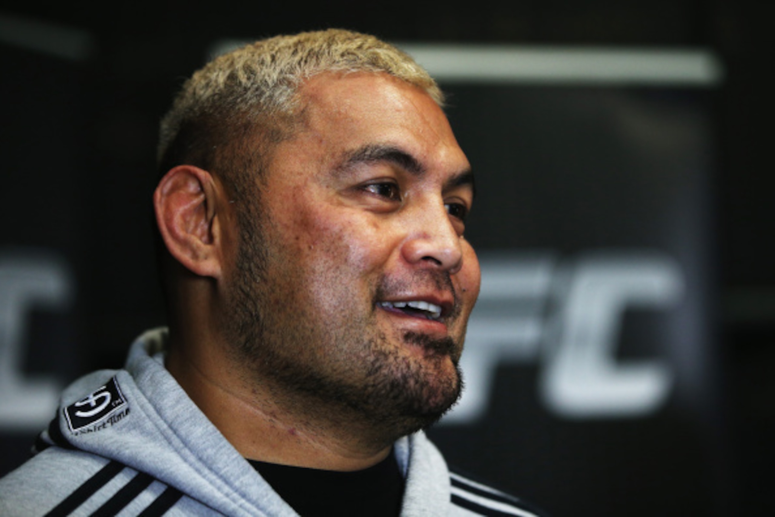 AUCKLAND, NEW ZEALAND - SEPTEMBER 03:  Mark Hunt is interviewed during the UFC Fight Night media session at SKY TV Gym on September 3, 2014 in Auckland, New Zealand.  (Photo by Hannah Peters/Getty Images)