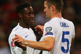 LONDON, ENGLAND - NOVEMBER 15:  Danny Welbeck of England is congratulated by Gary Cahill of England during the EURO 2016 Qualifier Group E match between England and Slovenia at Wembley Stadium on November 15, 2014 in London, England.  (Photo by Bryn Lenno