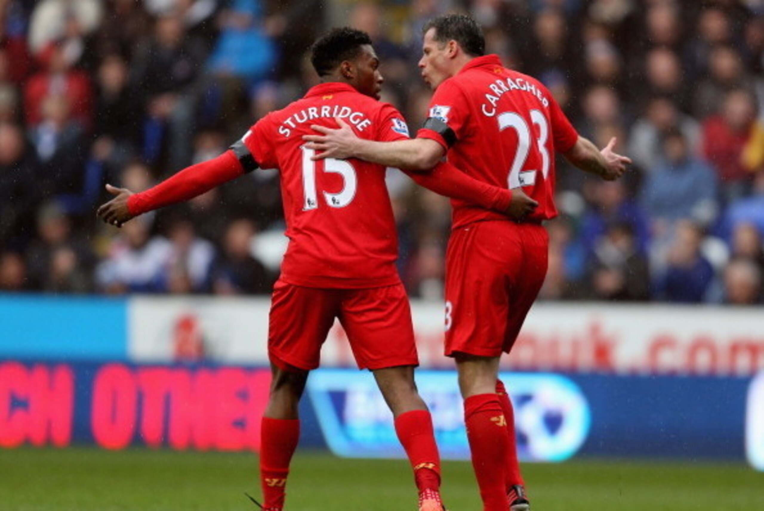 READING, ENGLAND - APRIL 13:  Daniel Sturridge and Jamie Carragher of Liverpool have an exchange of words during the Barclays Premier League match between Reading and Liverpool at the Madejski Stadium on April 13, 2013 in Reading, England.  (Photo by Warr