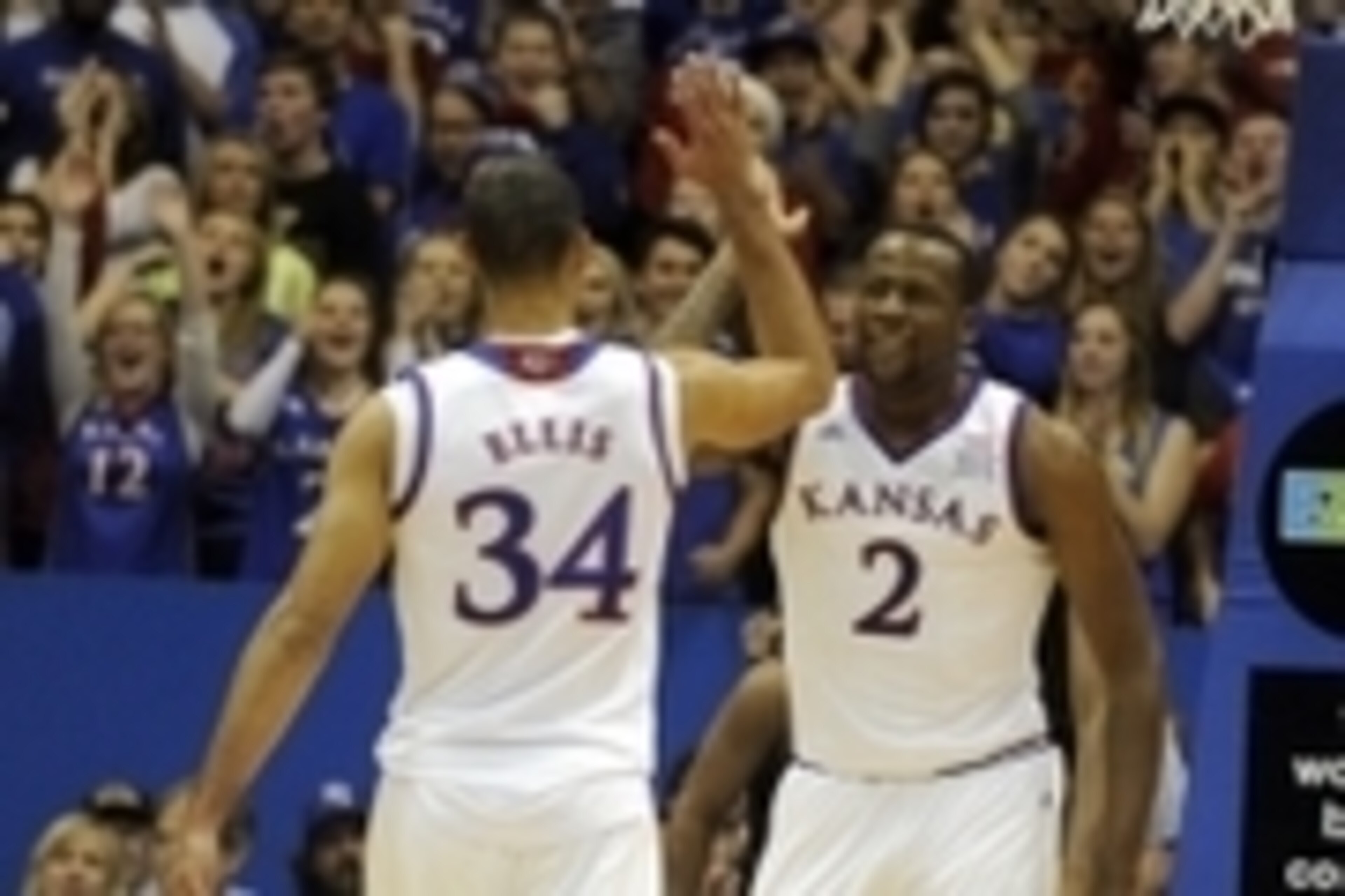 Nov 11, 2014; Lawrence, KS, USA; Kansas Jayhawks forward Cliff Alexander (2) celebrates with forward Perry Ellis (34) after a basket against the Emporia State Hornets in the second half at Allen Fieldhouse. Kansas won the game 109-56. Mandatory Credit: Jo