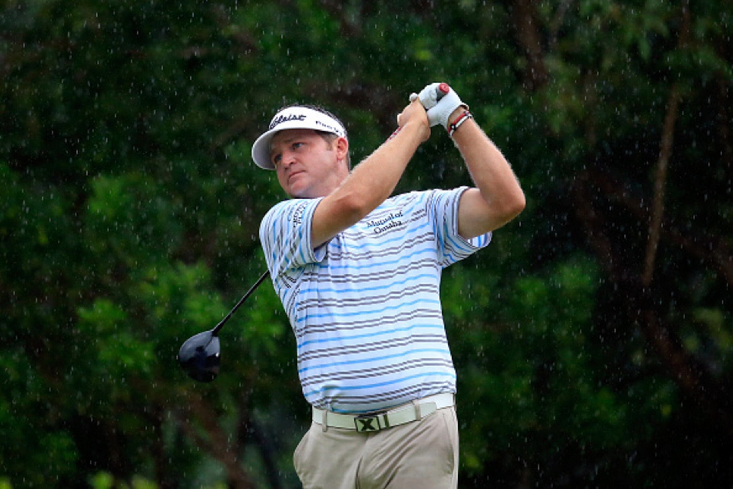 PLAYA DEL CARMEN, MEXICO - NOVEMBER 15:  Jason Bohn of the United States looks at his driver after teeing off on the 7th hole during the third round of the OHL Classic at Mayakoba on November 15, 2014 in Playa del Carmen, Mexico.  (Photo by Rob Carr/Getty