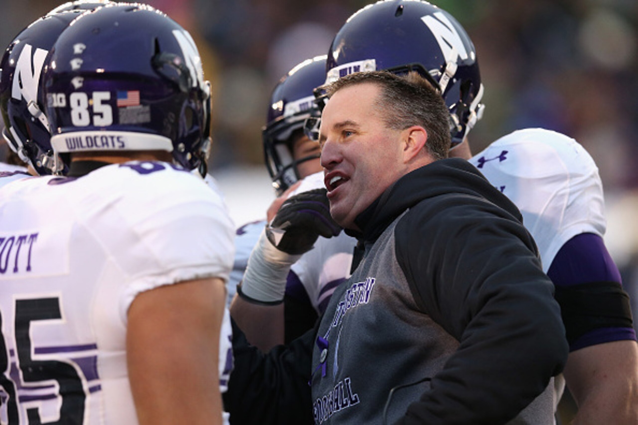 SOUTH BEND, IN - NOVEMBER 15: Head coach Pat Fitzgerald of the Northwestern Wildcats talks to players during a game against the Notre Dame Fighting Irish at Notre Dame Stadium on November 15, 2014 in South Bend, Indiana. (Photo by Jonathan Daniel/Getty Im