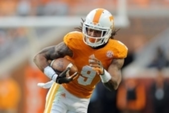 Nov 15, 2014; Knoxville, TN, USA; Tennessee Volunteers wide receiver Von Pearson (9) runs the ball against the Kentucky Wildcats during the first half at Neyland Stadium. Mandatory Credit: Randy Sartin-USA TODAY Sports
