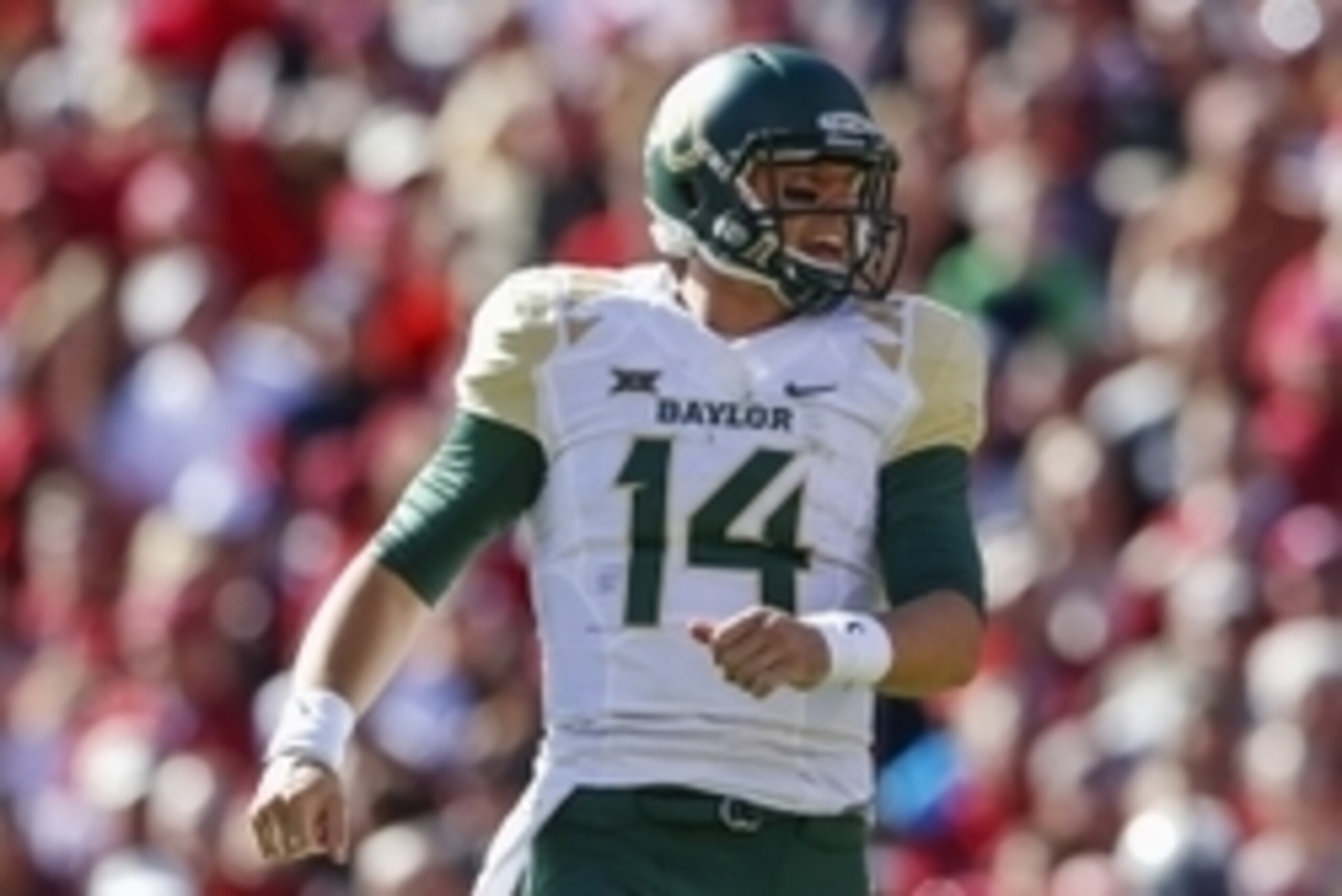 Nov 8, 2014; Norman, OK, USA; Baylor Bears quarterback Bryce Petty (14) celebrates a touchdown during the game against the Oklahoma Sooners at Gaylord Family - Oklahoma Memorial Stadium. Mandatory Credit: Kevin Jairaj-USA TODAY Sports Nov 8, 2014; Norman, OK, USA; Baylor Bears quarterback Bryce Petty (14) celebrates a touchdown during the game against the Oklahoma Sooners at Gaylord Family - Oklahoma Memorial Stadium. Mandatory Credit: Kevin Jairaj-USA TODAY Sports