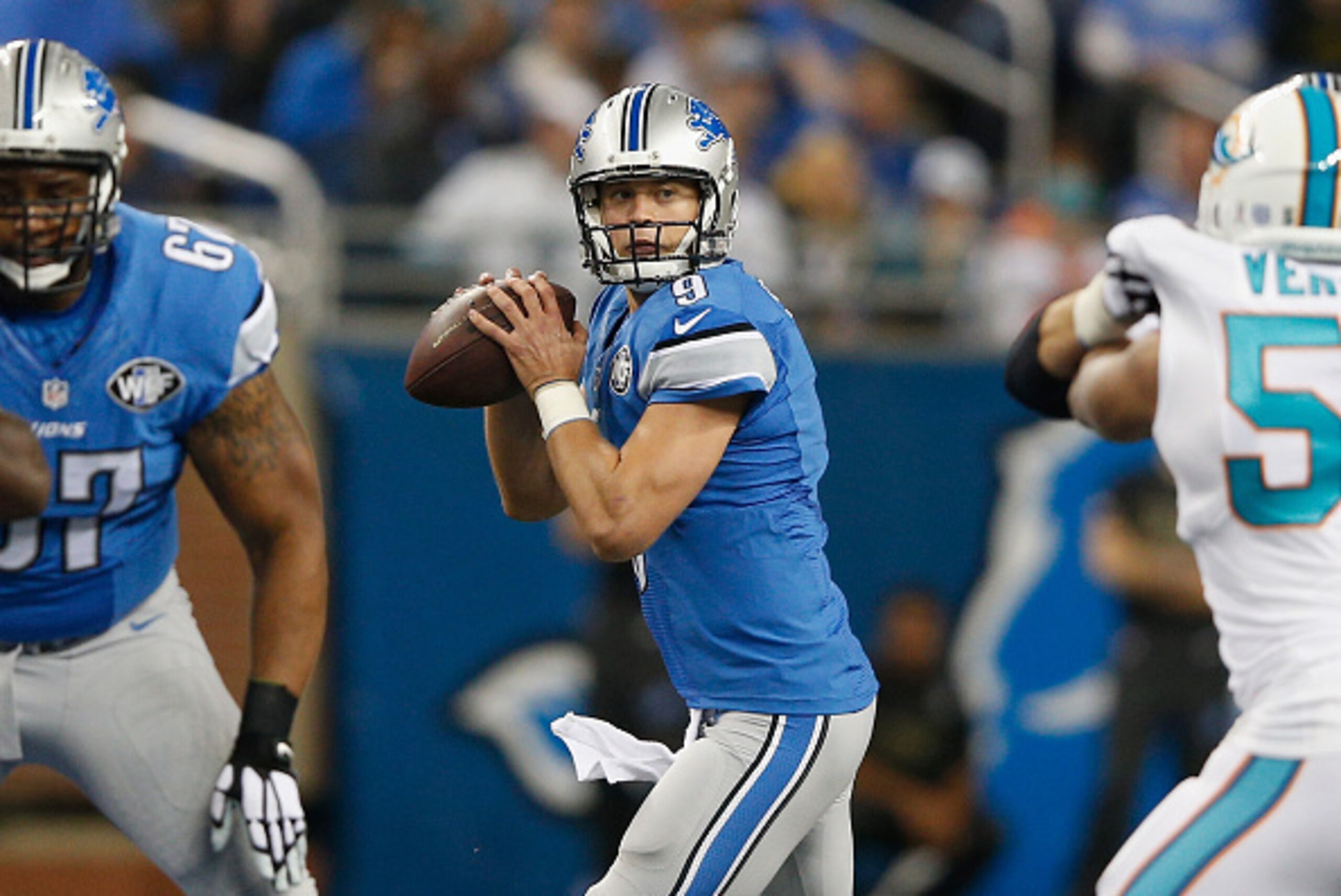 DETROIT, MI - NOVEMBER 09: Matthew Stafford #9 of the Detroit Lions looks to throw a first quarter pass against the Miami Dolphins at Ford Field on November 09, 2014 in Detroit, Michigan. (Photo by Joe Robbins/Getty Images) DETROIT, MI - NOVEMBER 09: Matthew Stafford #9 of the Detroit Lions looks to throw a first quarter pass against the Miami Dolphins at Ford Field on November 09, 2014 in Detroit, Michigan. (Photo by Joe Robbins/Getty Images)