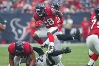 Nov 2, 2014; Houston, TX, USA; Houston Texans running back Alfred Blue (28) during the game against the Philadelphia Eagles at NRG Stadium. Mandatory Credit: Troy Taormina-USA TODAY Sports