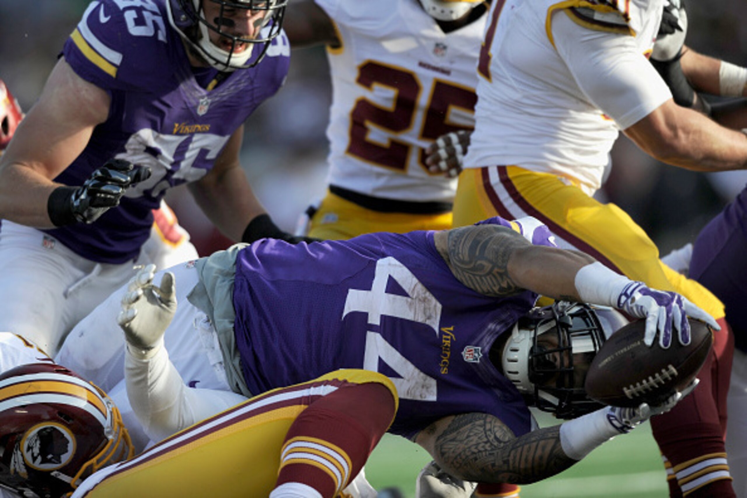 MINNEAPOLIS, MN - NOVEMBER 2: Matt Asiata #44 of the Minnesota Vikings scores a touchdown against the Washington Redskins during the fourth quarter of the game on November 2, 2014 at TCF Bank Stadium in Minneapolis, Minnesota. The Vikings defeated the Red MINNEAPOLIS, MN - NOVEMBER 2: Matt Asiata #44 of the Minnesota Vikings scores a touchdown against the Washington Redskins during the fourth quarter of the game on November 2, 2014 at TCF Bank Stadium in Minneapolis, Minnesota. The Vikings defeated the Red