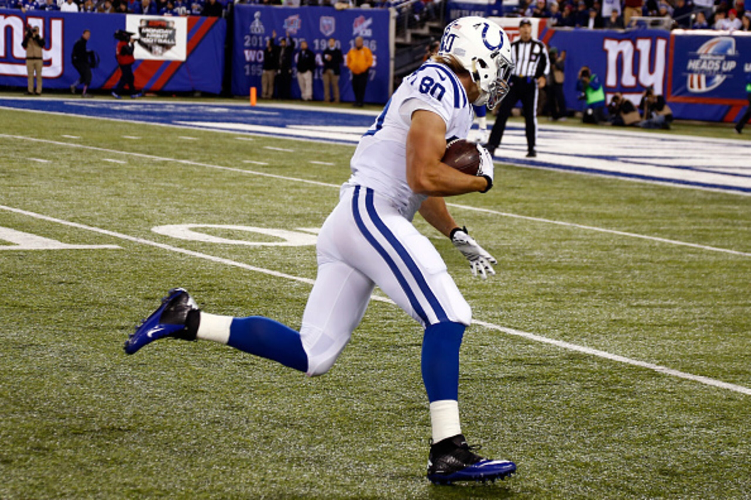 EAST RUTHERFORD, NJ - NOVEMBER 03: Coby Fleener #80 of the Indianapolis Colts scores a 32 yard touchdown in the second quarter against the New York Giants during their game at MetLife Stadium on November 3, 2014 in East Rutherford, New Jersey. (Photo by EAST RUTHERFORD, NJ - NOVEMBER 03: Coby Fleener #80 of the Indianapolis Colts scores a 32 yard touchdown in the second quarter against the New York Giants during their game at MetLife Stadium on November 3, 2014 in East Rutherford, New Jersey. (Photo by