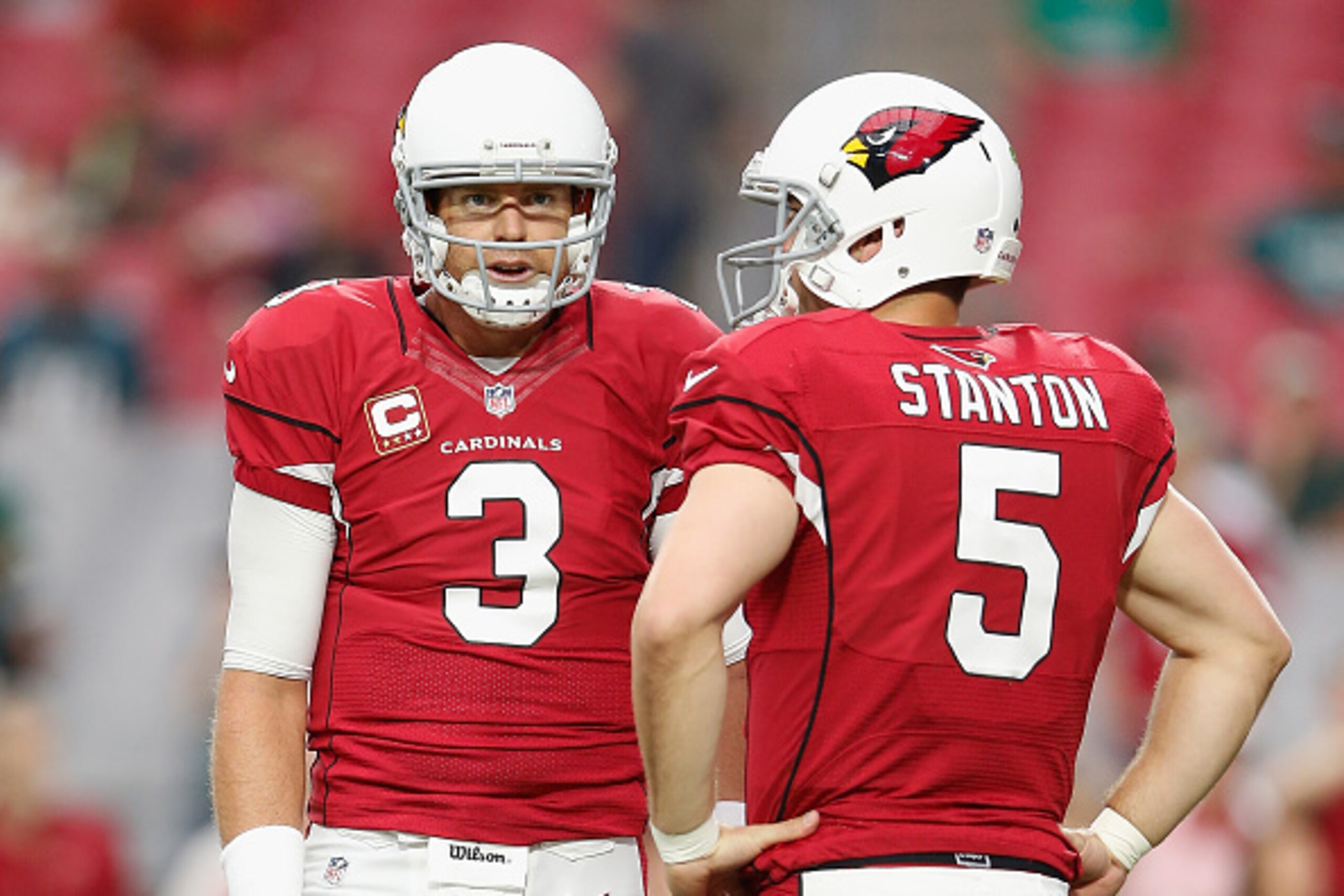 GLENDALE, AZ - OCTOBER 26:  Quarterbacks Carson Palmer #3 and  Drew Stanton #5 of the Arizona Cardinals before the NFL game against the Philadelphia Eagles at the University of Phoenix Stadium on October 26, 2014 in Glendale, Arizona.  (Photo by Christian