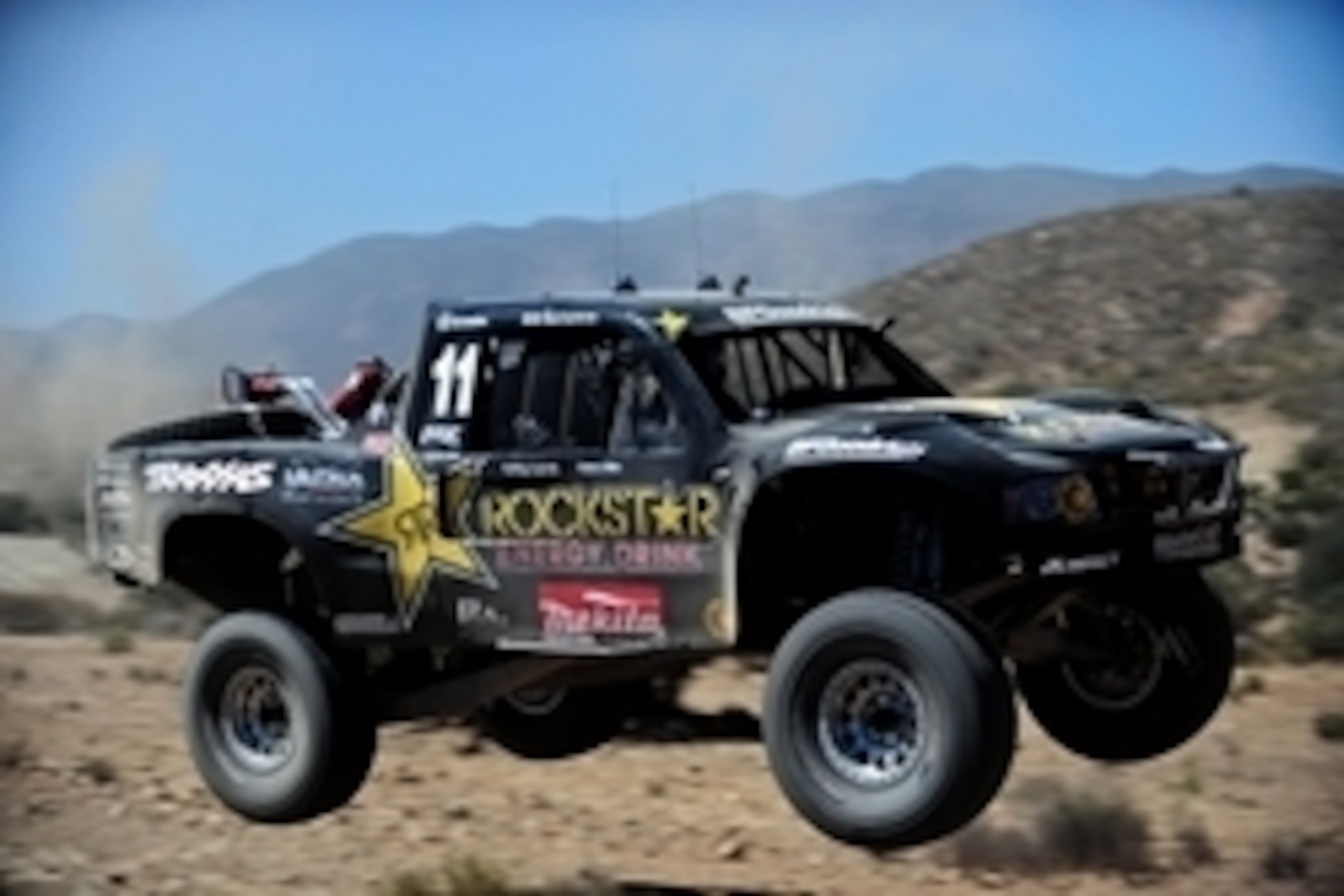 Jun 5, 2014; Ojos Negros, BC, Mexico; SCORE trophy truck driver Rob MacCachren jumps during qualifying for the Tecate SCORE Baja 500. Mandatory Credit: Matt Kartozian-USA TODAY Sports