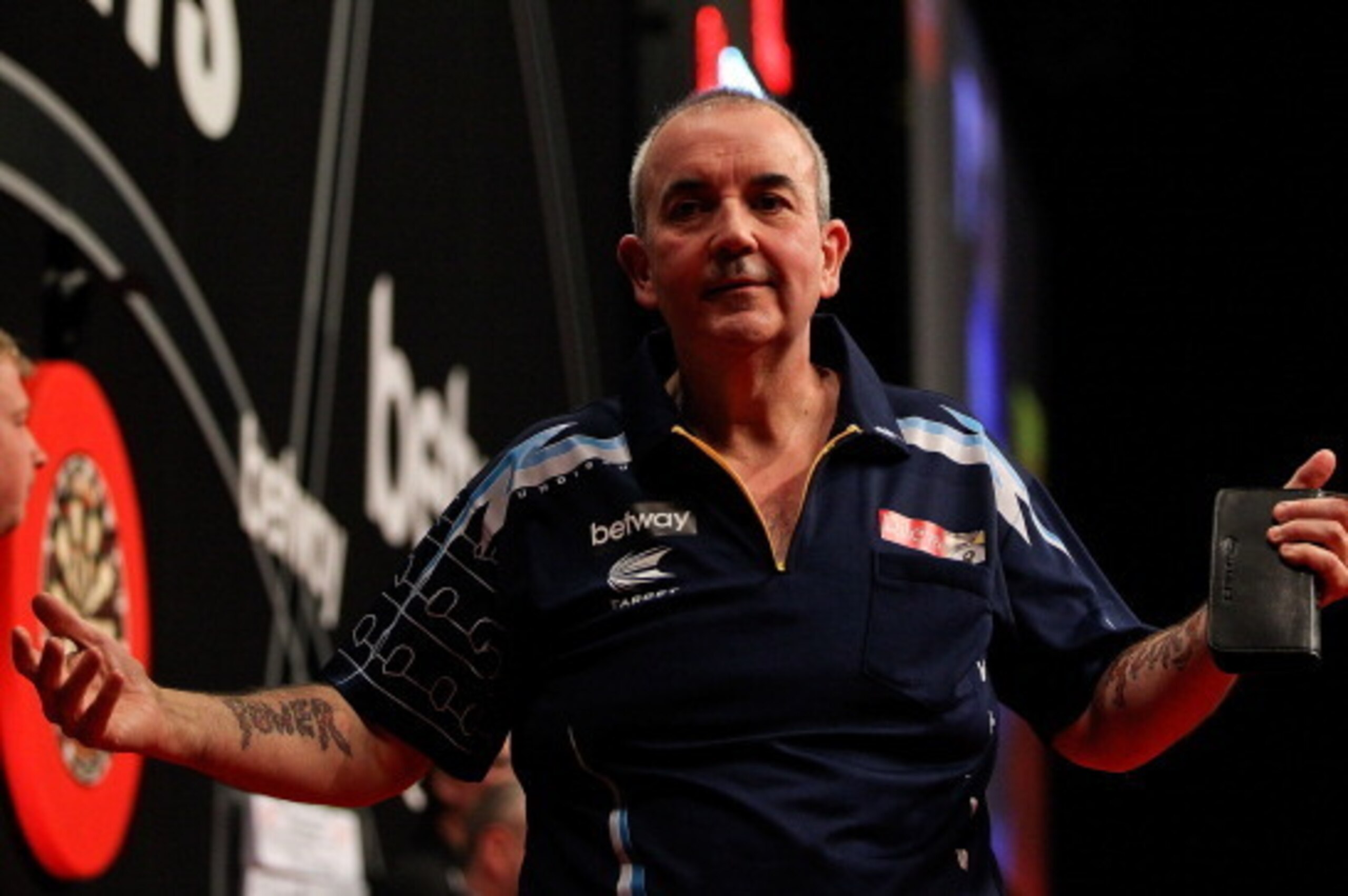 LONDON, ENGLAND - MAY 22: Phil Taylor of England reacts during the McCoys Premier League Darts Play-Offs Semi Final match between Raymond van Barneveld and Phil Taylor at O2 Arena on May 22, 2014 in London, England. (Photo by Ben Hoskins/Getty Images) LONDON, ENGLAND - MAY 22: Phil Taylor of England reacts during the McCoys Premier League Darts Play-Offs Semi Final match between Raymond van Barneveld and Phil Taylor at O2 Arena on May 22, 2014 in London, England. (Photo by Ben Hoskins/Getty Images)