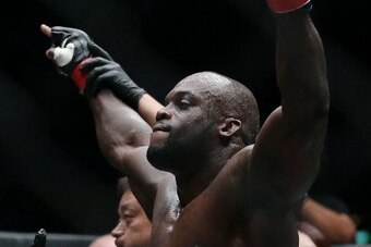 SINGAPORE - OCTOBER 06:  Melvin Manhoef of the Netherlands celebrates victory over Ryo Kawamura of Japan during the One Fighting Championship, at Singapore Indoor Stadium on October 6, 2012 in Singapore.  (Photo by Chris McGrath/Getty Images)