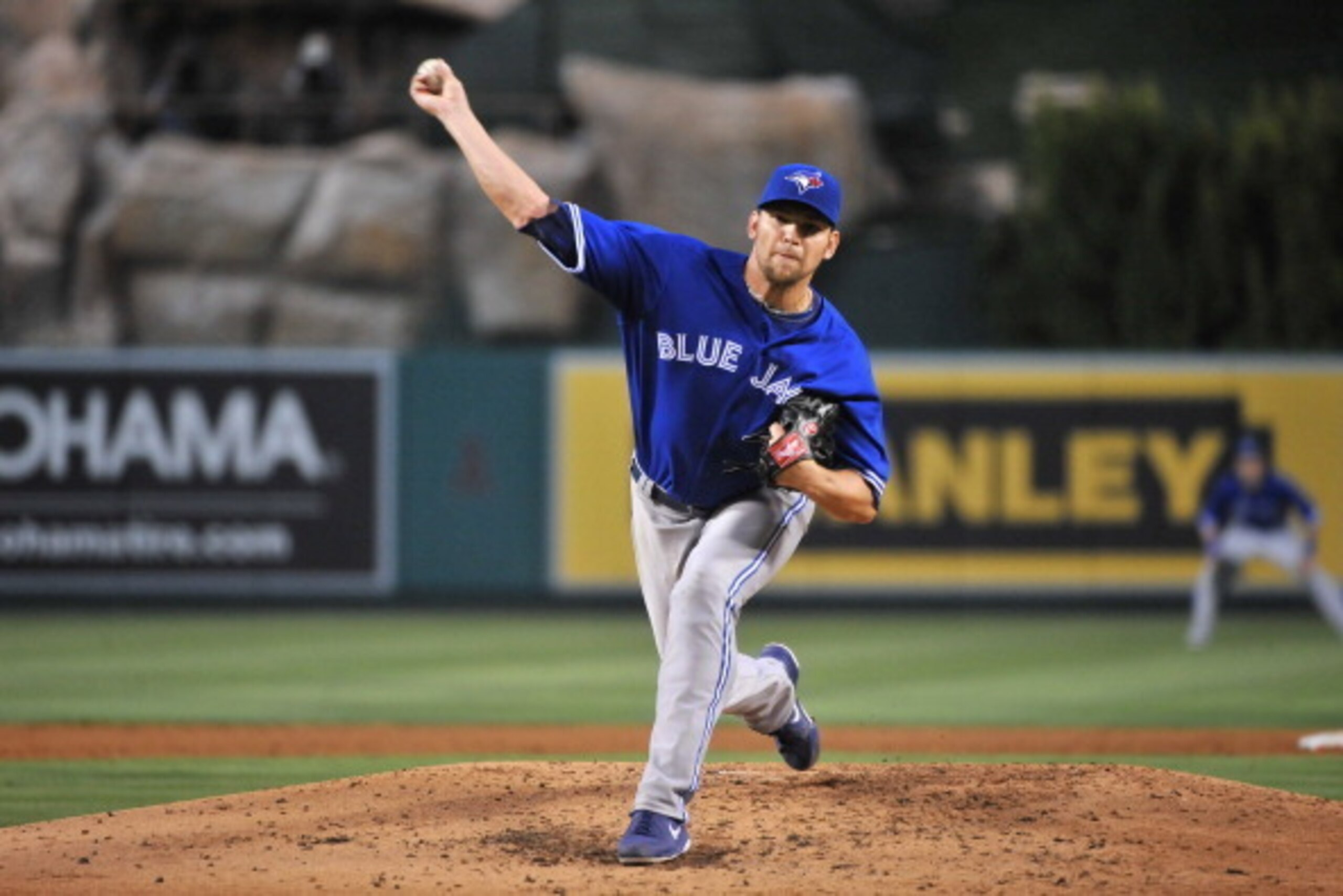 ANAHEIM, CA - AUGUST 01:  Starting pitcher Josh Johnson #55 of the Toronto Blue Jays pitches against the Los Angeles Angels of Anaheim in the third inning at Angel Stadium of Anaheim on August 1, 2013 in Anaheim, California.  (Photo by Jonathan Moore/Gett