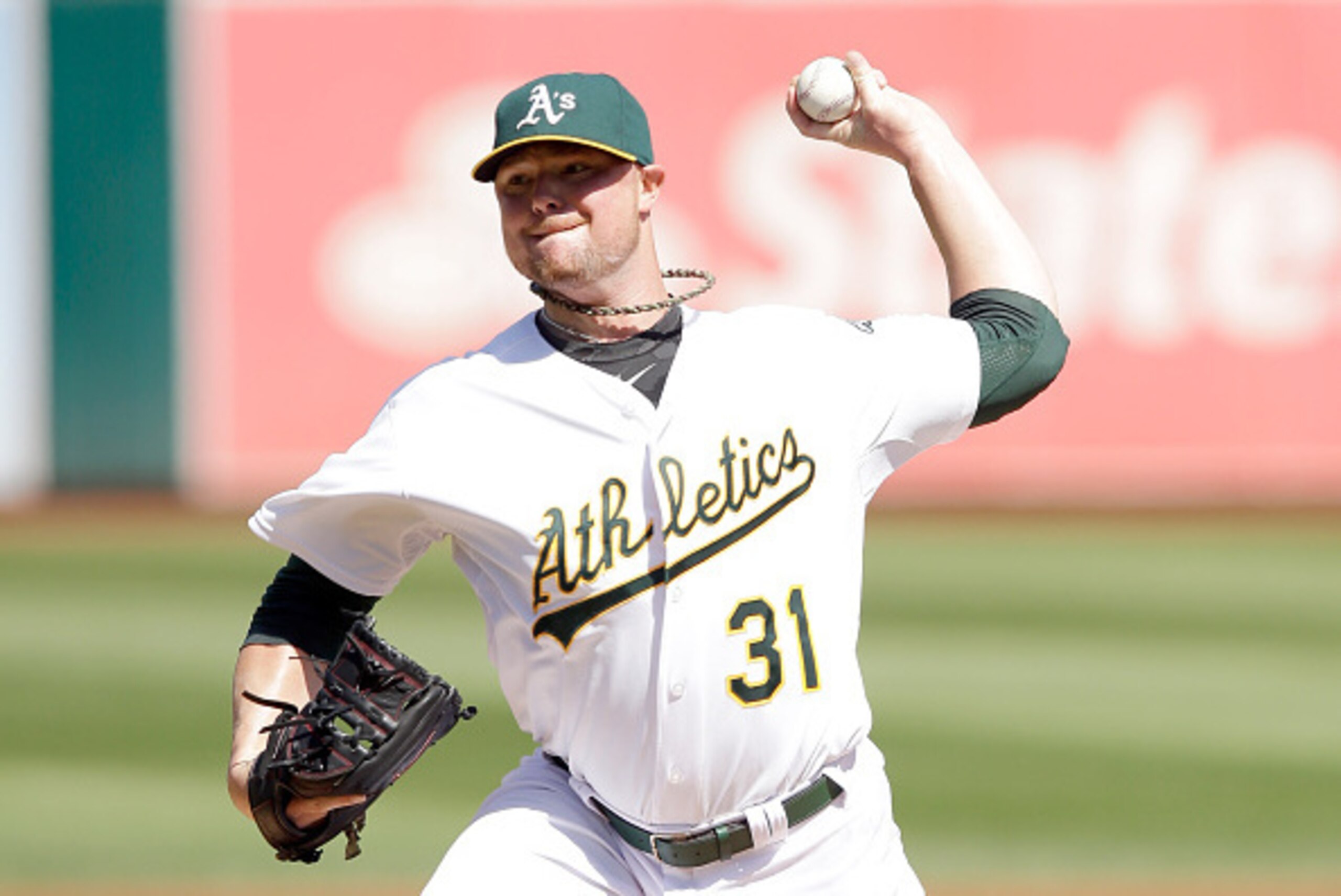 OAKLAND, CA - SEPTEMBER 24:  Jon Lester #31 of the Oakland Athletics pitches against the Los Angeles Angels of Anaheim at O.co Coliseum on September 24, 2014 in Oakland, California.  (Photo by Ezra Shaw/Getty Images)
