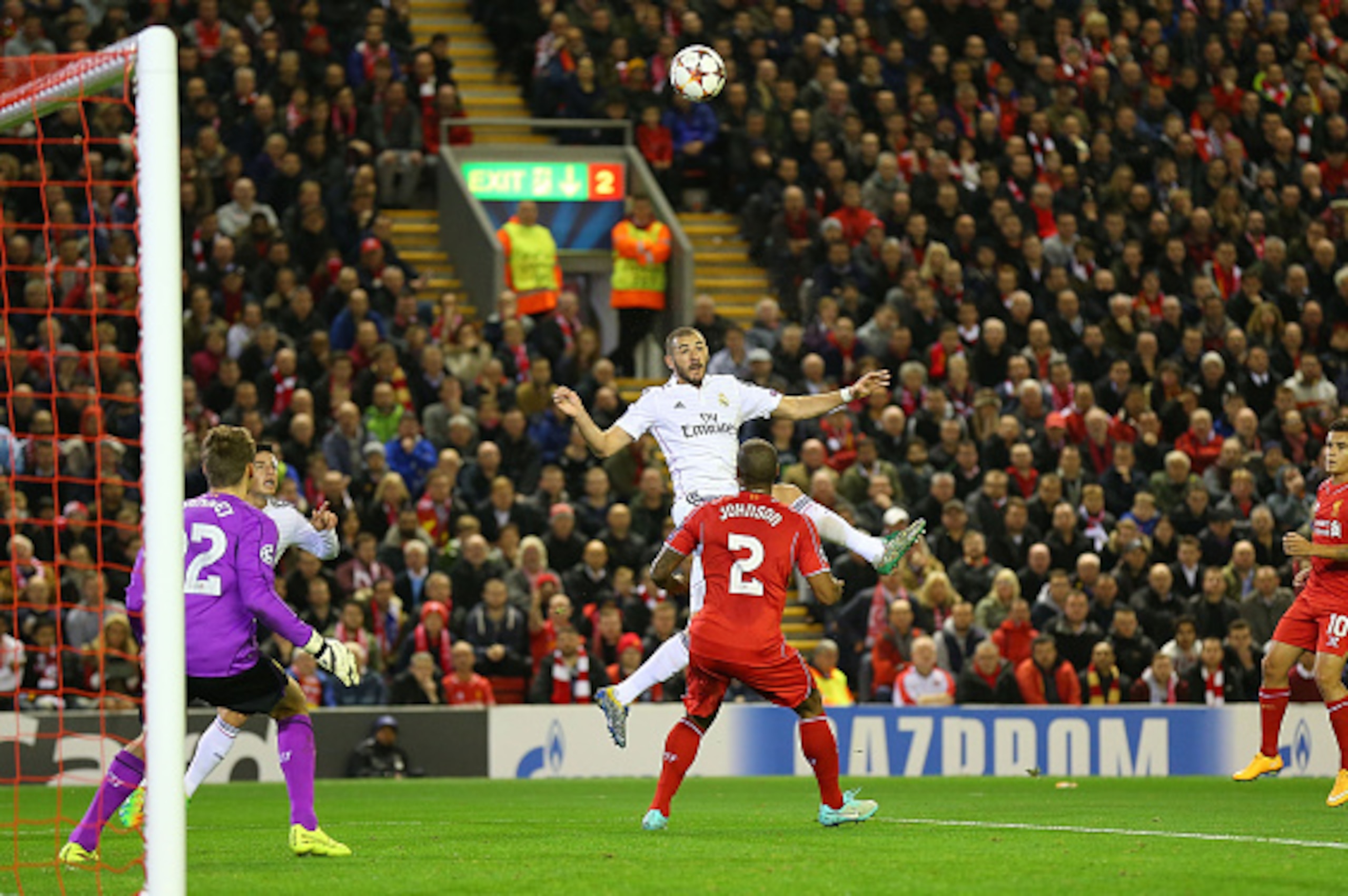 LIVERPOOL, ENGLAND - OCTOBER 22: Karim Benzema of Real Madrid scores his team's second goal during the UEFA Champions League Group B match between Liverpool and Real Madrid CF on October 22, 2014 in Liverpool, United Kingdom. (Photo by Alex Livesey/Gett LIVERPOOL, ENGLAND - OCTOBER 22: Karim Benzema of Real Madrid scores his team's second goal during the UEFA Champions League Group B match between Liverpool and Real Madrid CF on October 22, 2014 in Liverpool, United Kingdom. (Photo by Alex Livesey/Gett