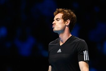 LONDON, ENGLAND - NOVEMBER 16: Andy Murray of Great Britain reacts in the exhibition match against Novak Djokovic of Serbia on day eight of the Barclays ATP World Tour Finals at O2 Arena on November 16, 2014 in London, England. The Singles final was repla