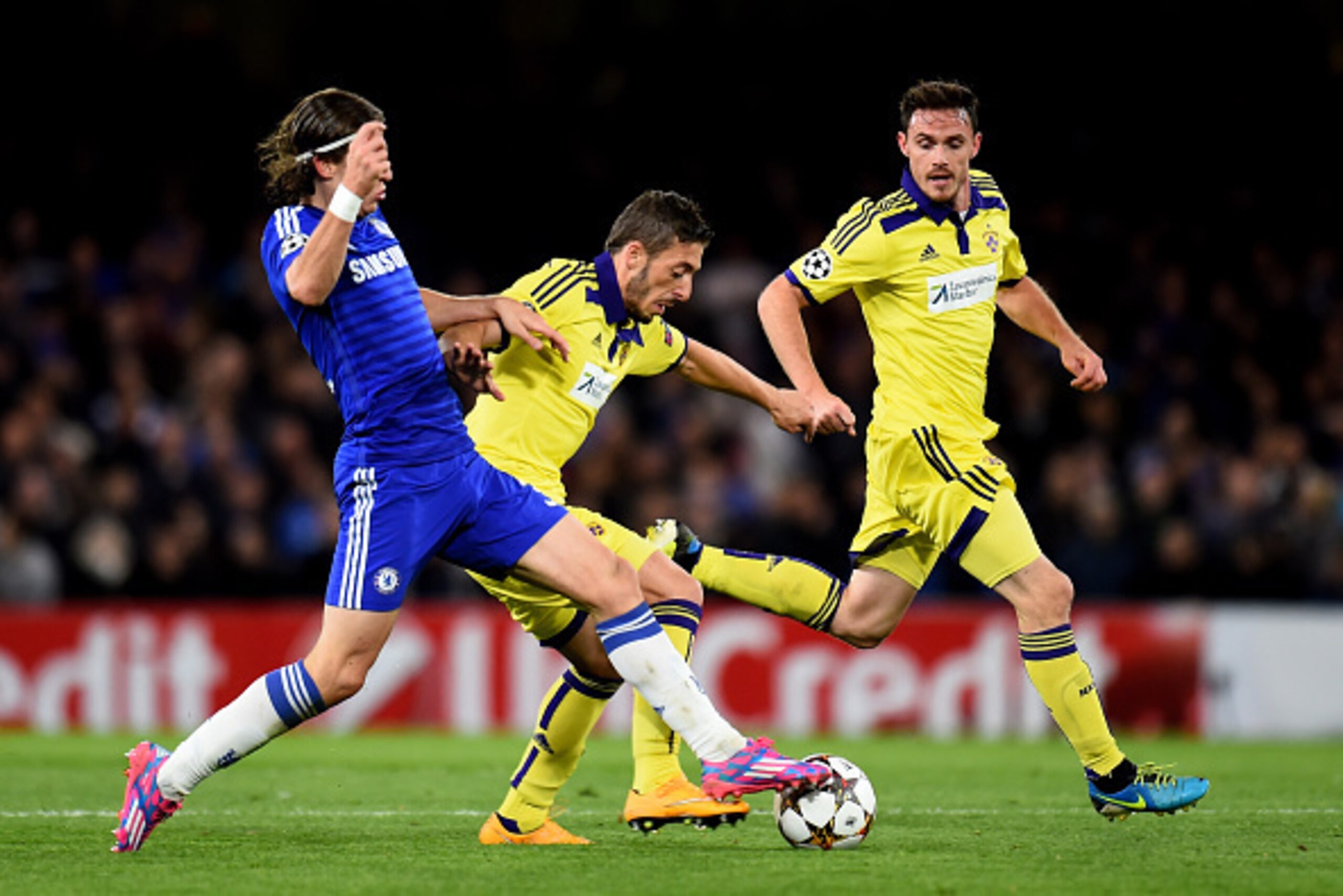 LONDON, ENGLAND - OCTOBER 21: Agim Ibraimi of Maribor is challenged by Filipe Luis of Chelsea during the UEFA Champions League Group G match between Chelsea FC and NK Maribor at Stamford Bridge on October 21, 2014 in London, United Kingdom. (Photo by Sh LONDON, ENGLAND - OCTOBER 21: Agim Ibraimi of Maribor is challenged by Filipe Luis of Chelsea during the UEFA Champions League Group G match between Chelsea FC and NK Maribor at Stamford Bridge on October 21, 2014 in London, United Kingdom. (Photo by Sh