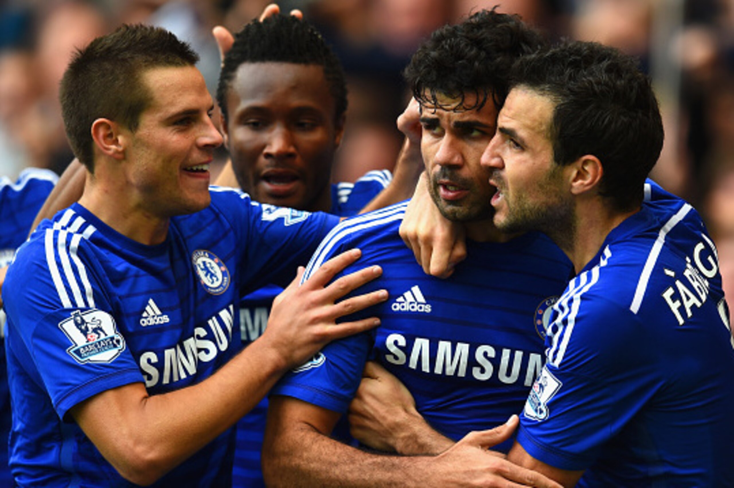 LONDON, ENGLAND - OCTOBER 05: Diego Costa of Chelsea celebrates scoring their second goal with Cesar Azpilicueta and Cesc Fabregas of Chelsea during the Barclays Premier League match between Chelsea and Arsenal at Stamford Bridge on October 4, 2014 in Lo LONDON, ENGLAND - OCTOBER 05: Diego Costa of Chelsea celebrates scoring their second goal with Cesar Azpilicueta and Cesc Fabregas of Chelsea during the Barclays Premier League match between Chelsea and Arsenal at Stamford Bridge on October 4, 2014 in Lo