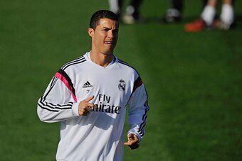 MADRID, SPAIN - OCTOBER 24:  Cristiano Ronaldo of Real Madrid CF warms up during a team training session the day before the La Liga match against FC Barcelona at Ciudad Deportivo Real Madrid on October 24, 2014 in Madrid, Spain.  (Photo by Denis Doyle/Get