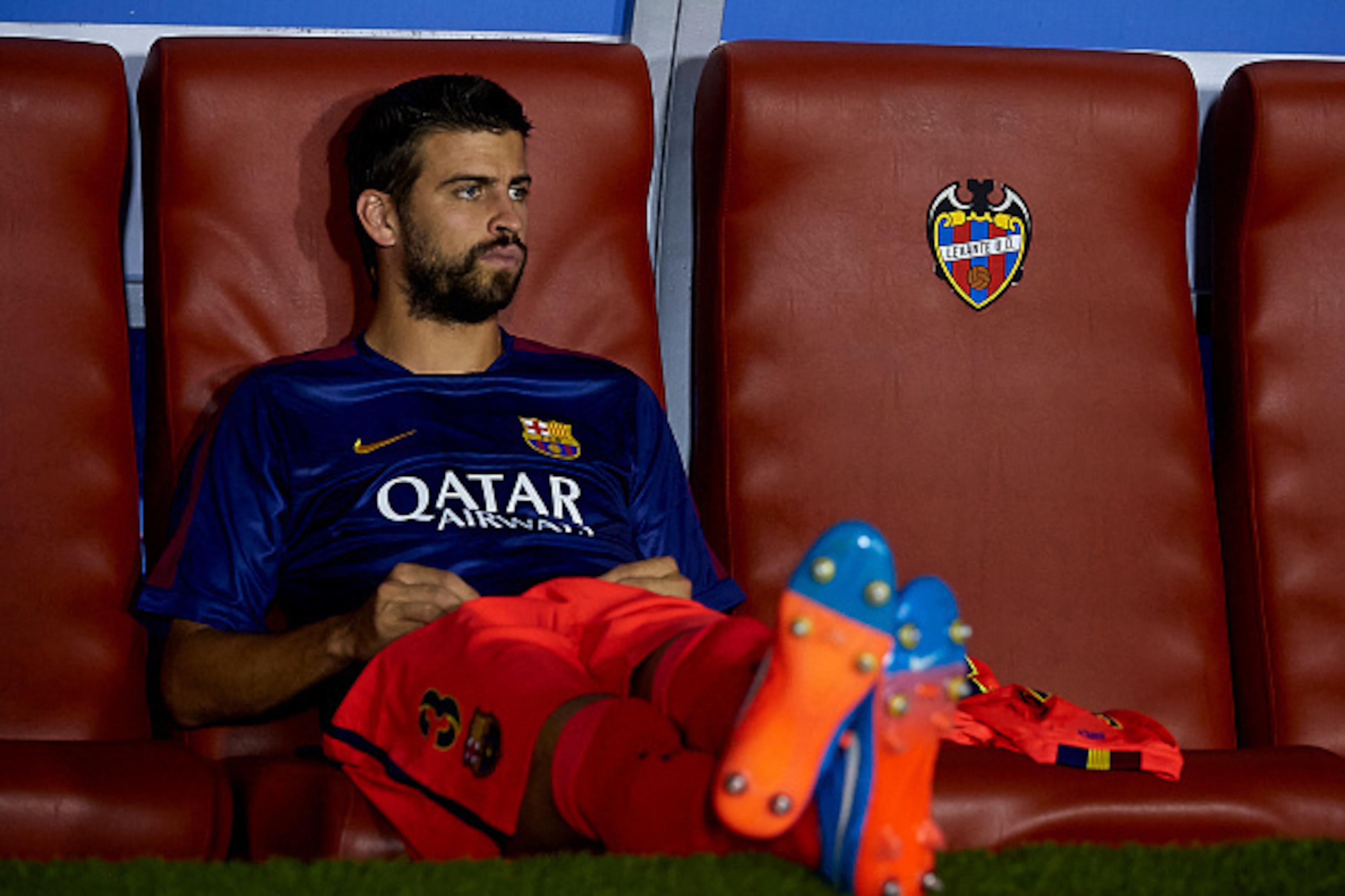VALENCIA, SPAIN - SEPTEMBER 21:  Gerard Pique of Barcelona watches from the subsitute bench prior to the La Liga match between Levante UD and FC Barcelona at Ciutat de Valencia on September 21, 2014 in Valencia, Spain.  (Photo by Manuel Queimadelos Alonso