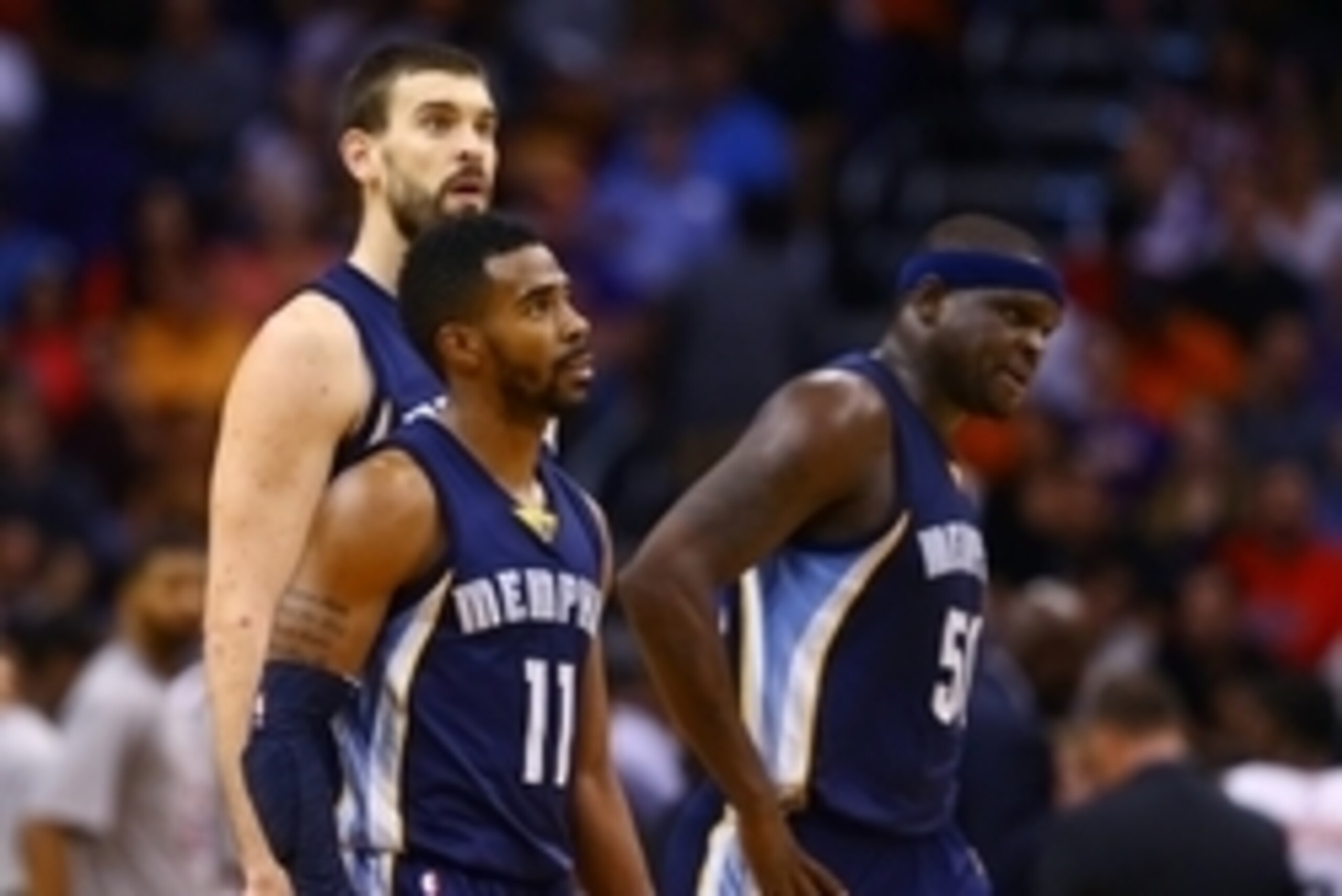 Nov 5, 2014; Phoenix, AZ, USA; Memphis Grizzlies guard Mike Conley (11), forward Zach Randolph (50) and center Marc Gasol against the Phoenix Suns at US Airways Center. The Grizzlies defeated the Suns 102-91. Mandatory Credit: Mark J. Rebilas-USA TODAY Sp