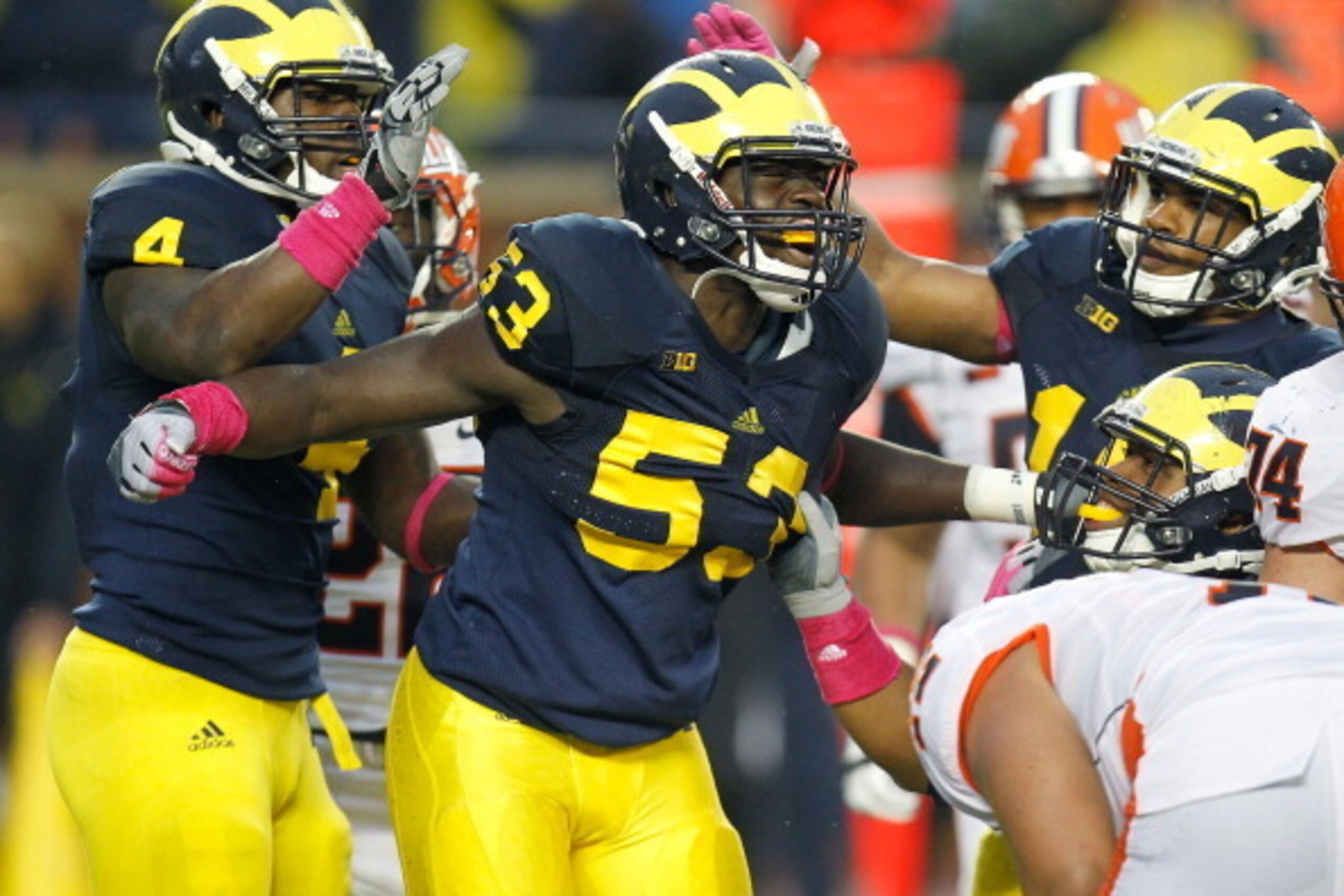 ANN ARBOR, MI - OCTOBER 13: Mario Ojemudia #53 of the Michigan Wolverines reacts after a fourth quarter sack while playing the Illinois Fighting Illini at Michigan Stadium on October 13, 2012 in Ann Arbor, Michigan. (Photo by Gregory Shamus/Getty Images) ANN ARBOR, MI - OCTOBER 13: Mario Ojemudia #53 of the Michigan Wolverines reacts after a fourth quarter sack while playing the Illinois Fighting Illini at Michigan Stadium on October 13, 2012 in Ann Arbor, Michigan. (Photo by Gregory Shamus/Getty Images)